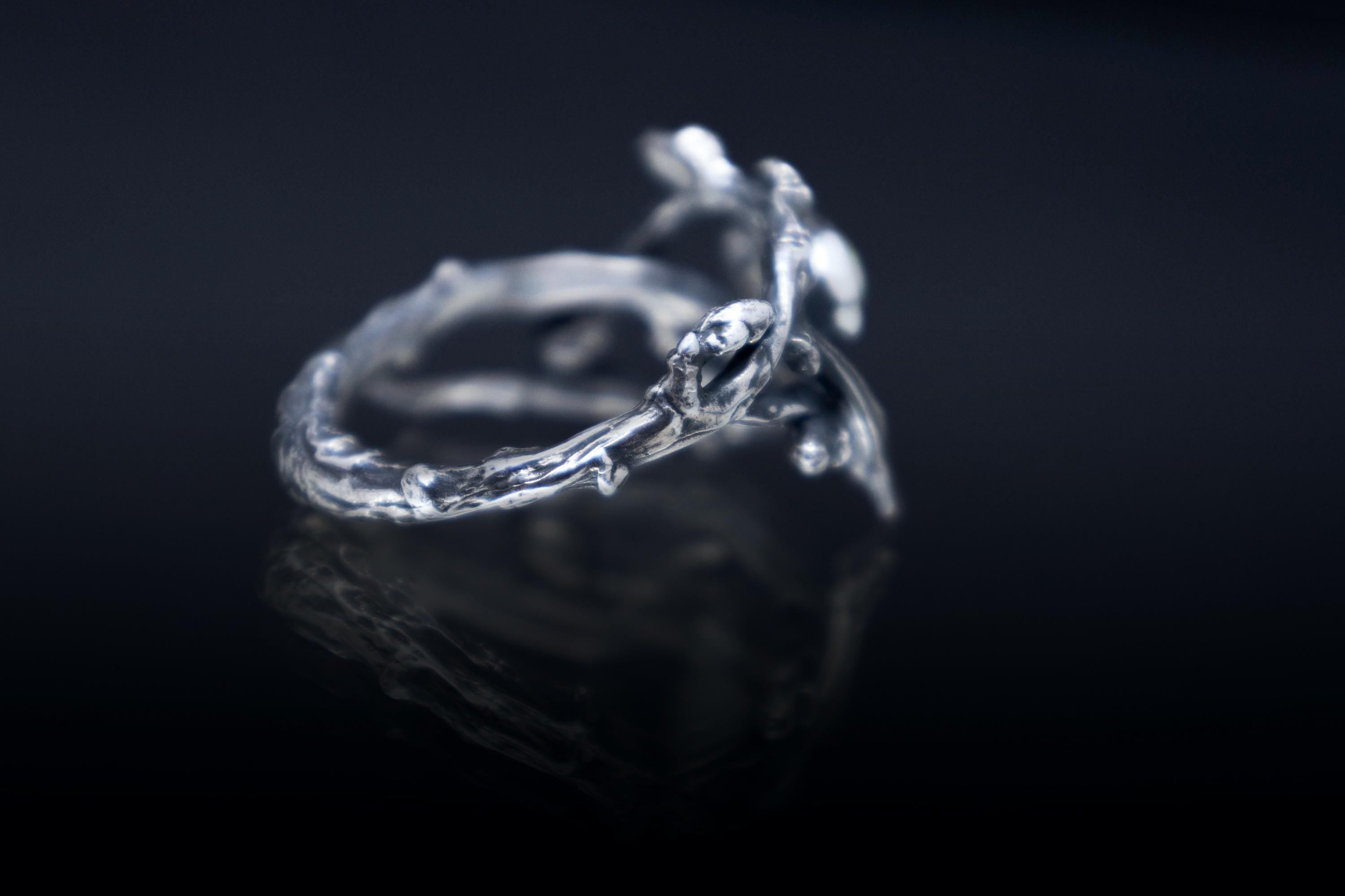 Silver ring made from real cast twigs with opal