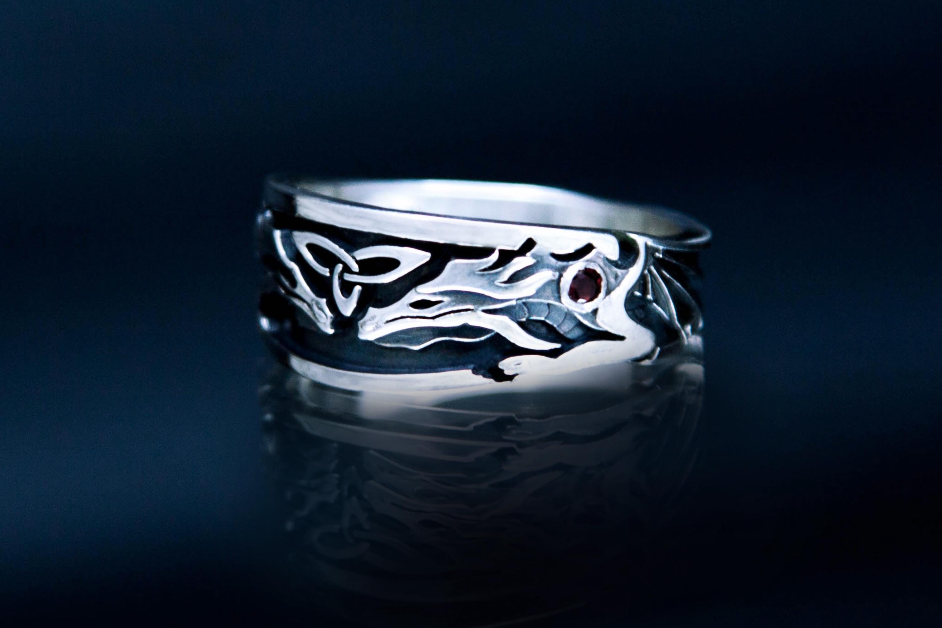 Sterling silver dragon ring with garnet stones