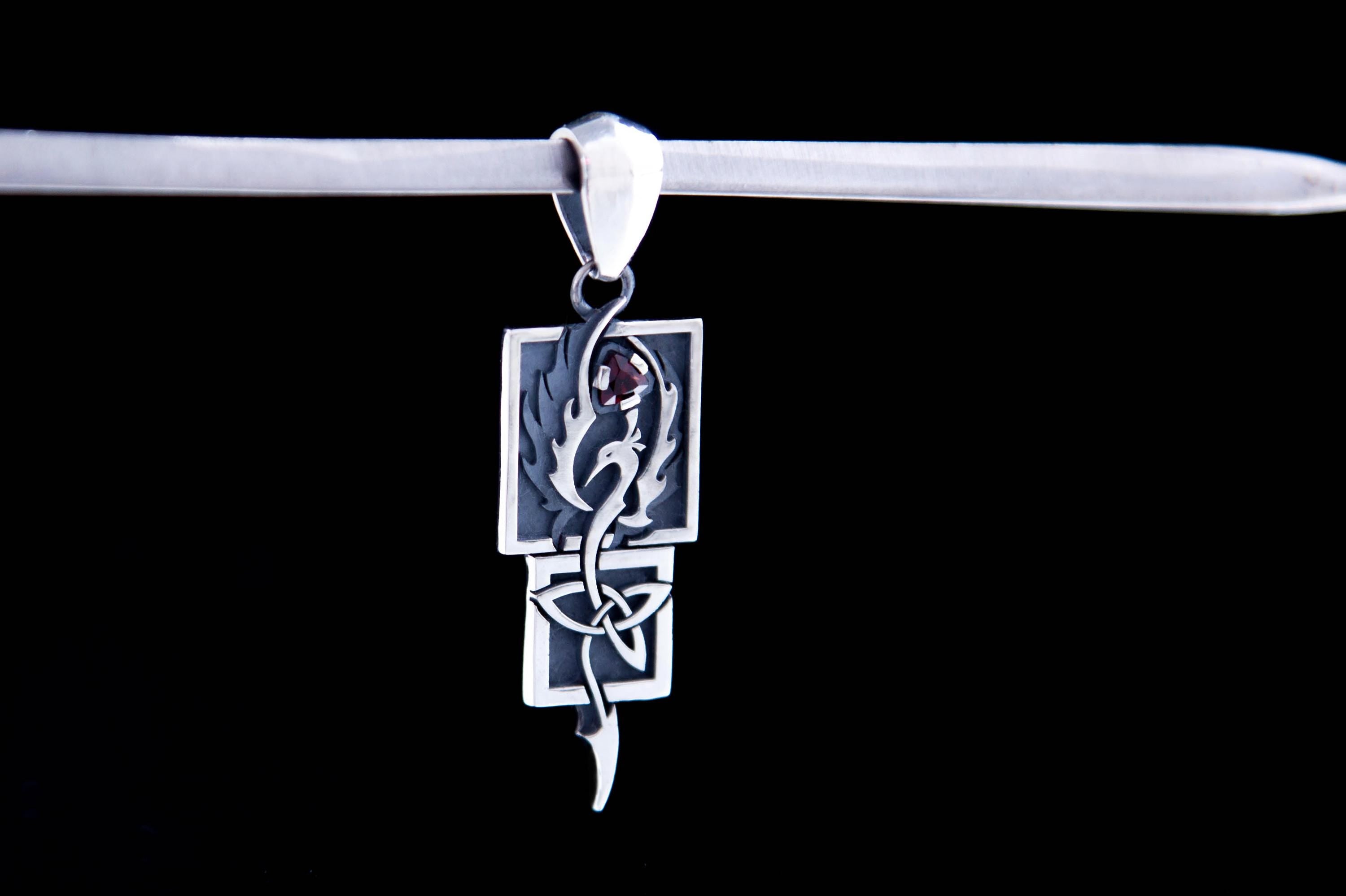Rising Phoenix silver necklace with natural red garnet