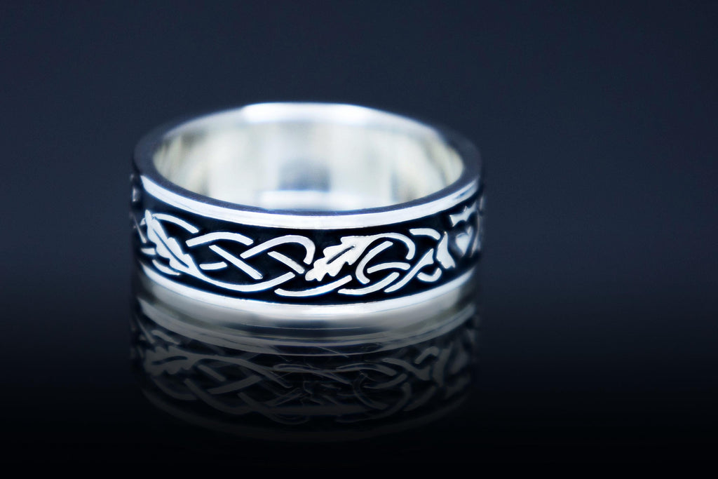 Unisex Celtic silver wedding band with oak ornament
