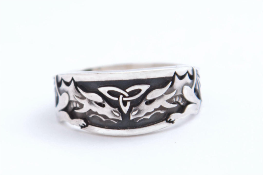 Celtic triquetra ring with two dragons
