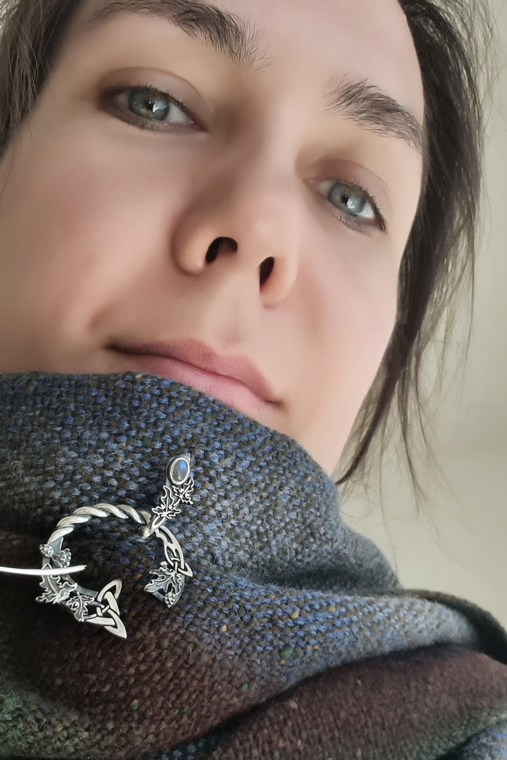 Elven style silver fibula with moonstone in use