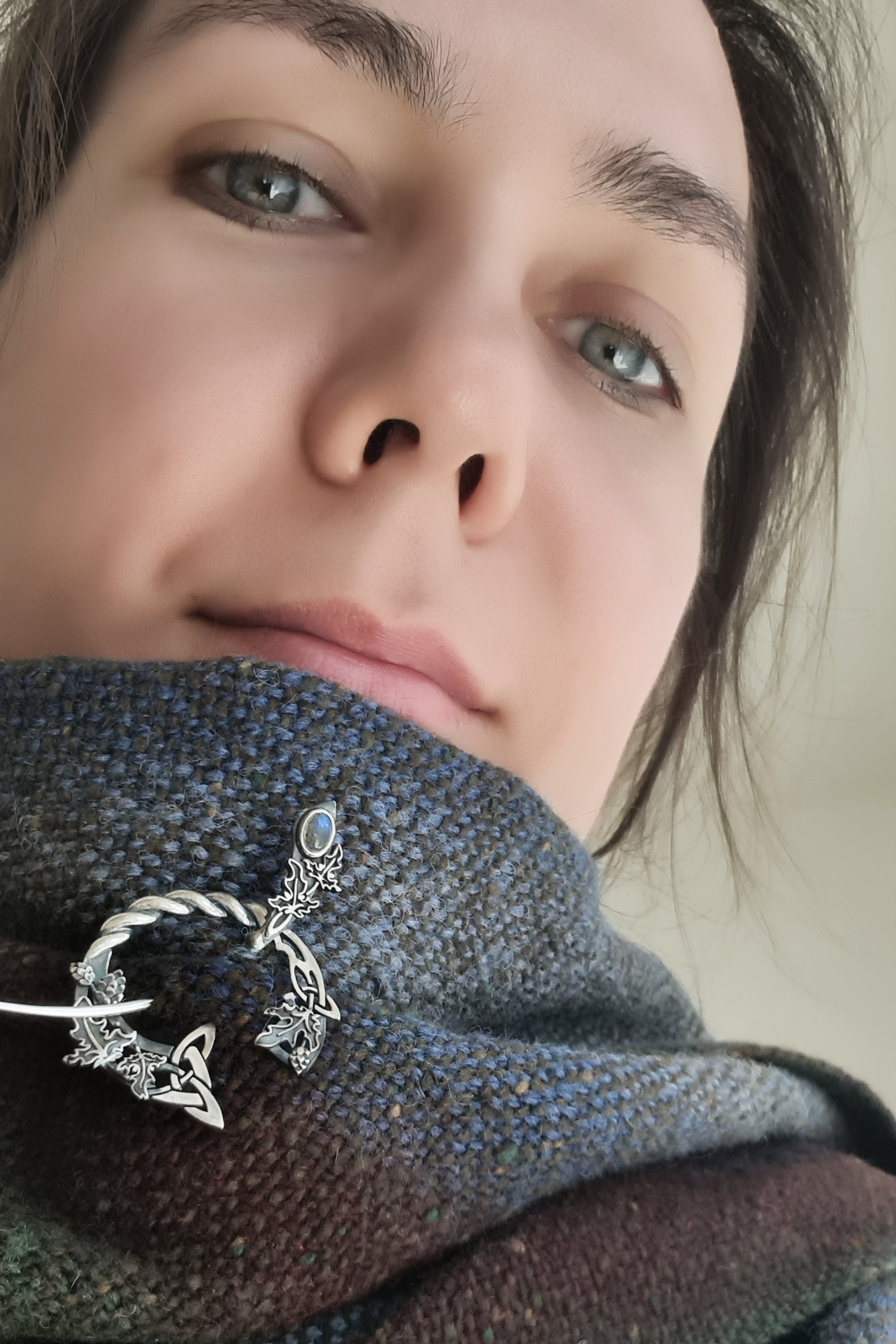 Elven style silver fibula with moonstone in use