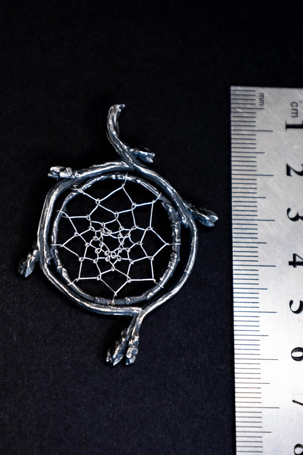 Dreamcatcher pendant with branches and fine silver web, handmade jewelry