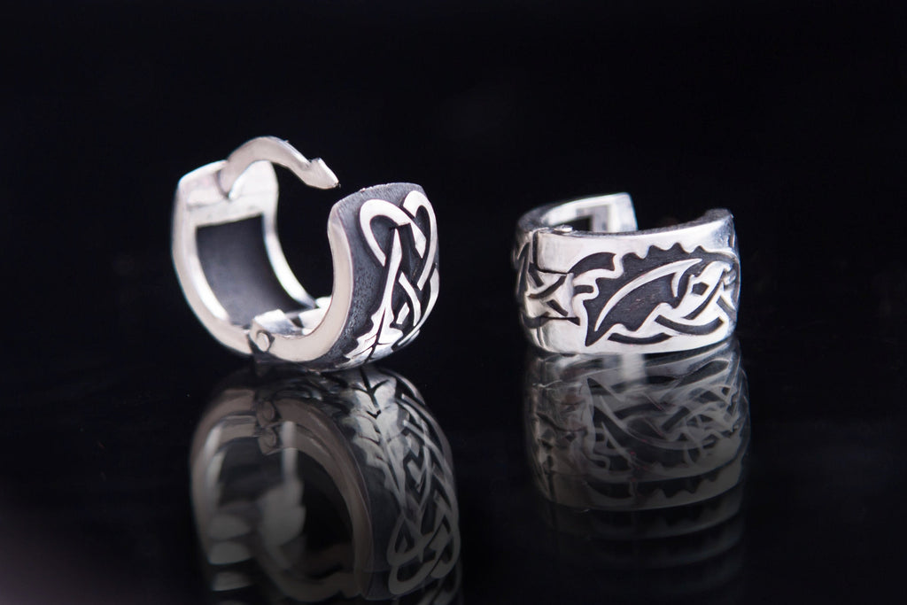 Sterling silver oak leaf earrings with contrasting raised and recessed patterns