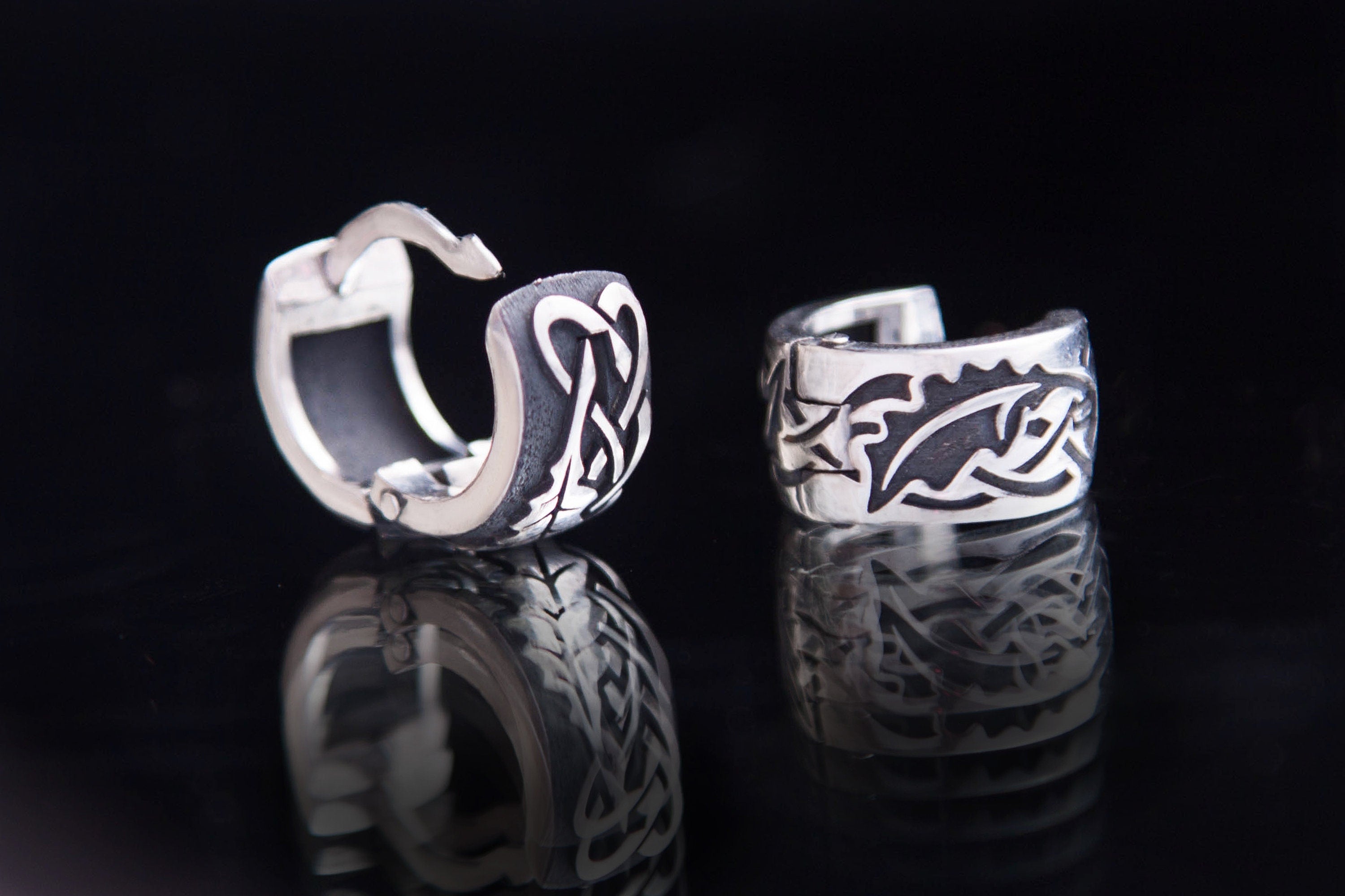 Sterling silver oak leaf earrings with contrasting raised and recessed patterns