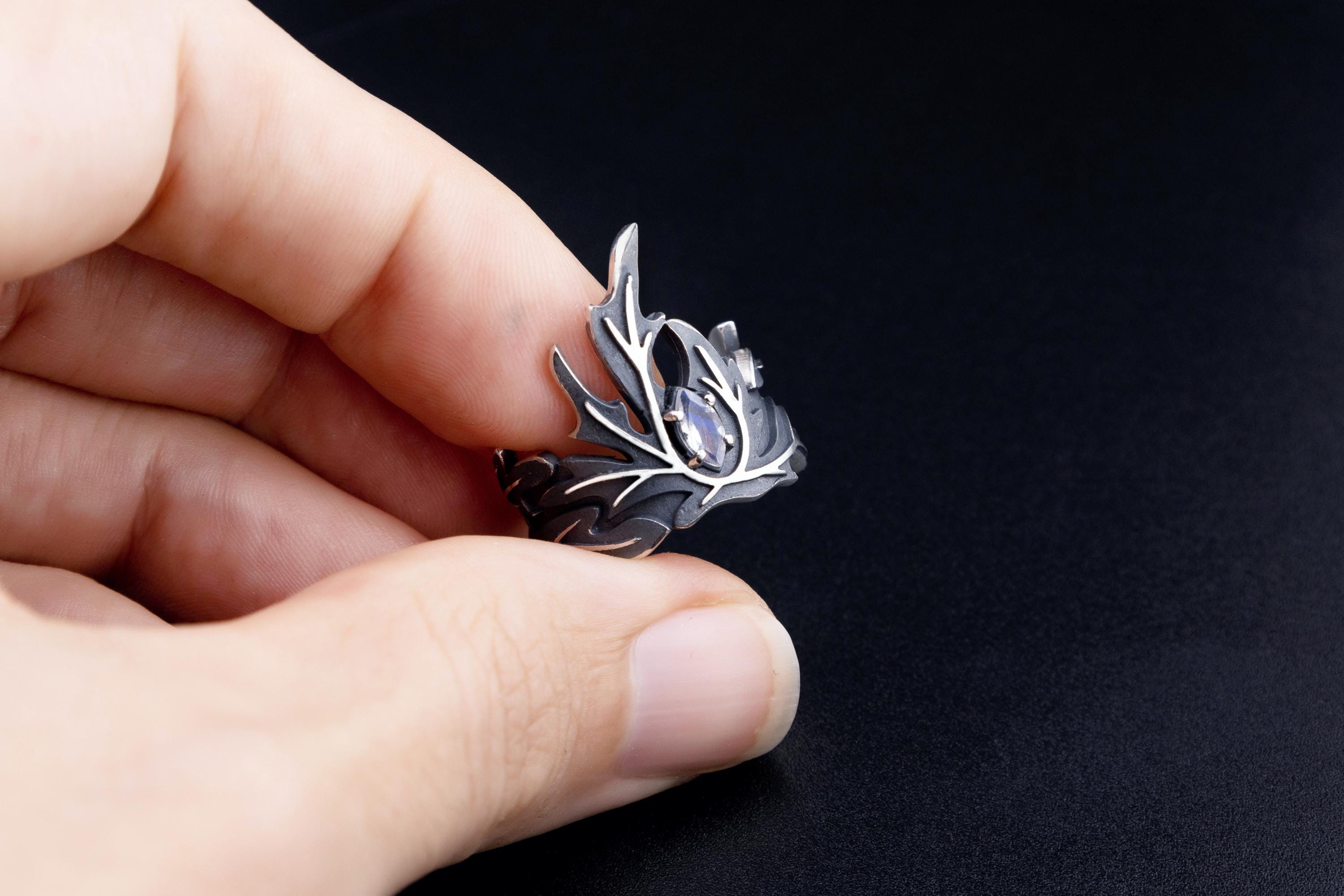 Silver wormwood crown ring with marquise moonstone