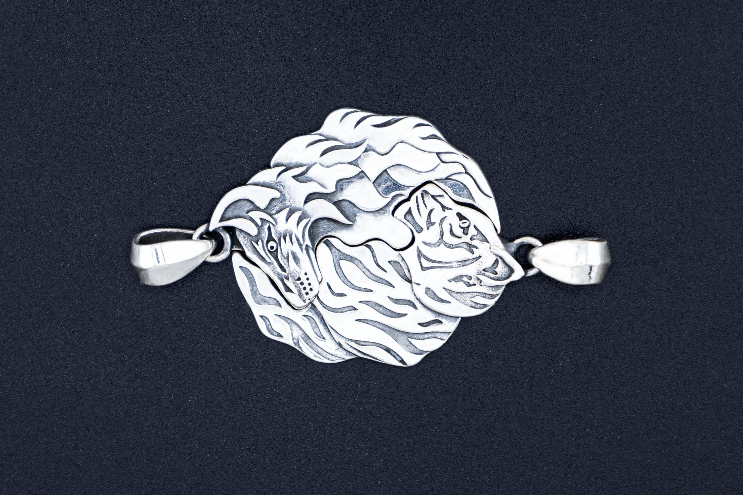 Matching pendants photographed together as a set