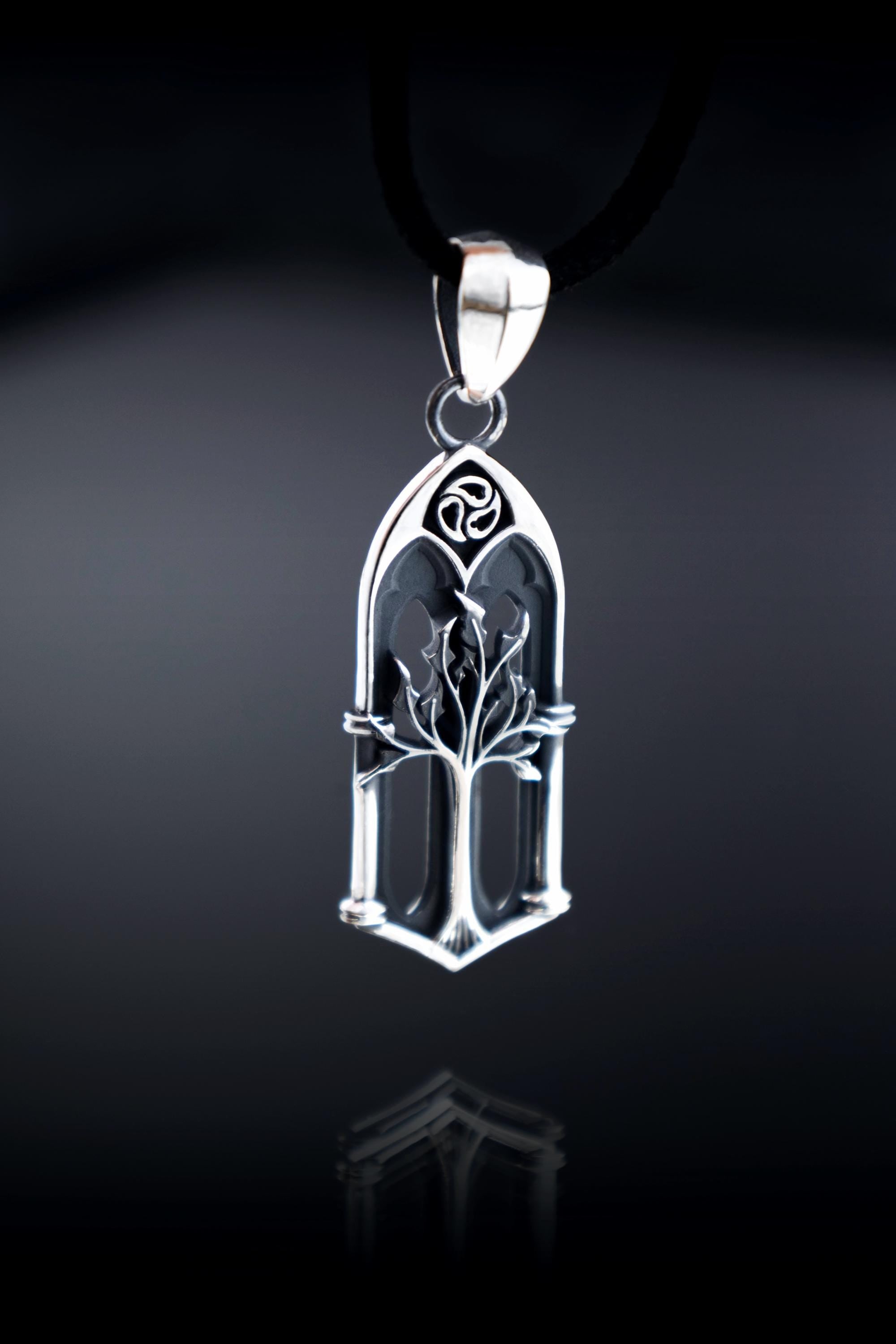 fantasy inspired sterling silver pendant