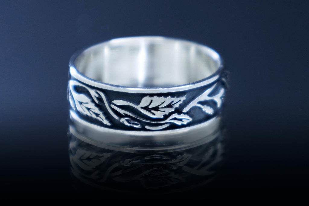 Nature inspired sterling silver band with forest motif