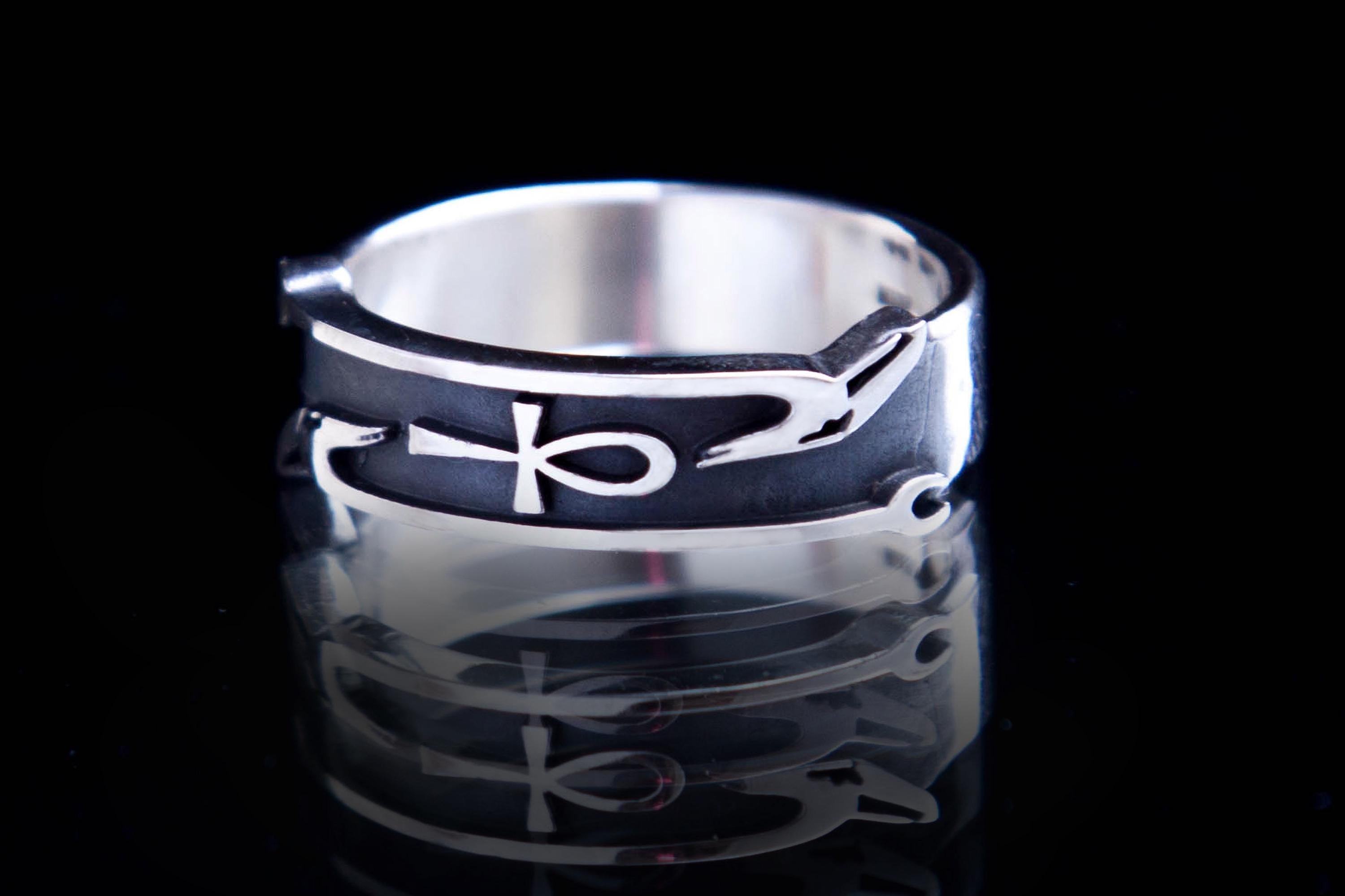 Sterling silver Egyptian Was Ankh ring on black background, oxidized details