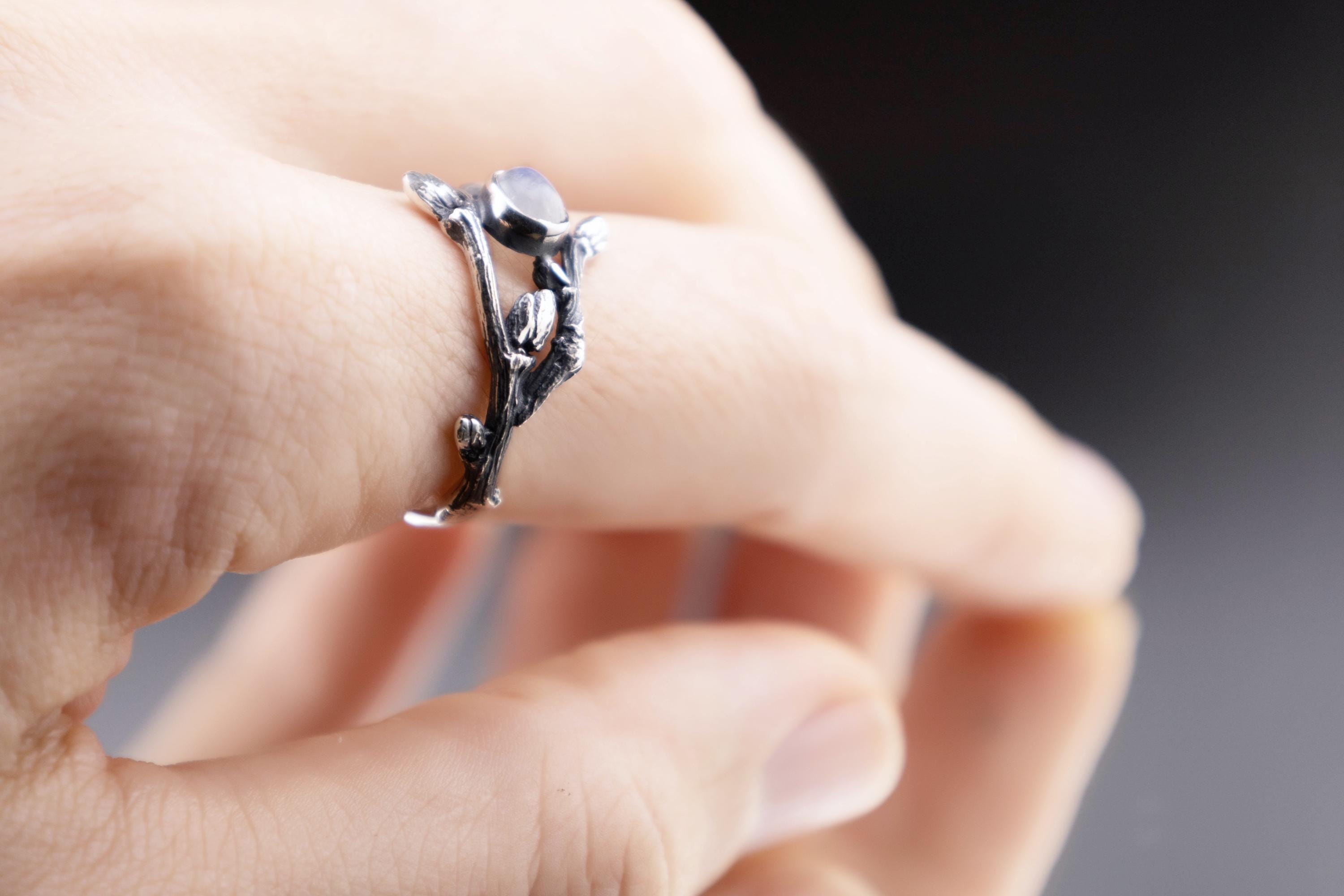 Close-up of moonstone twig ring showing bark texture