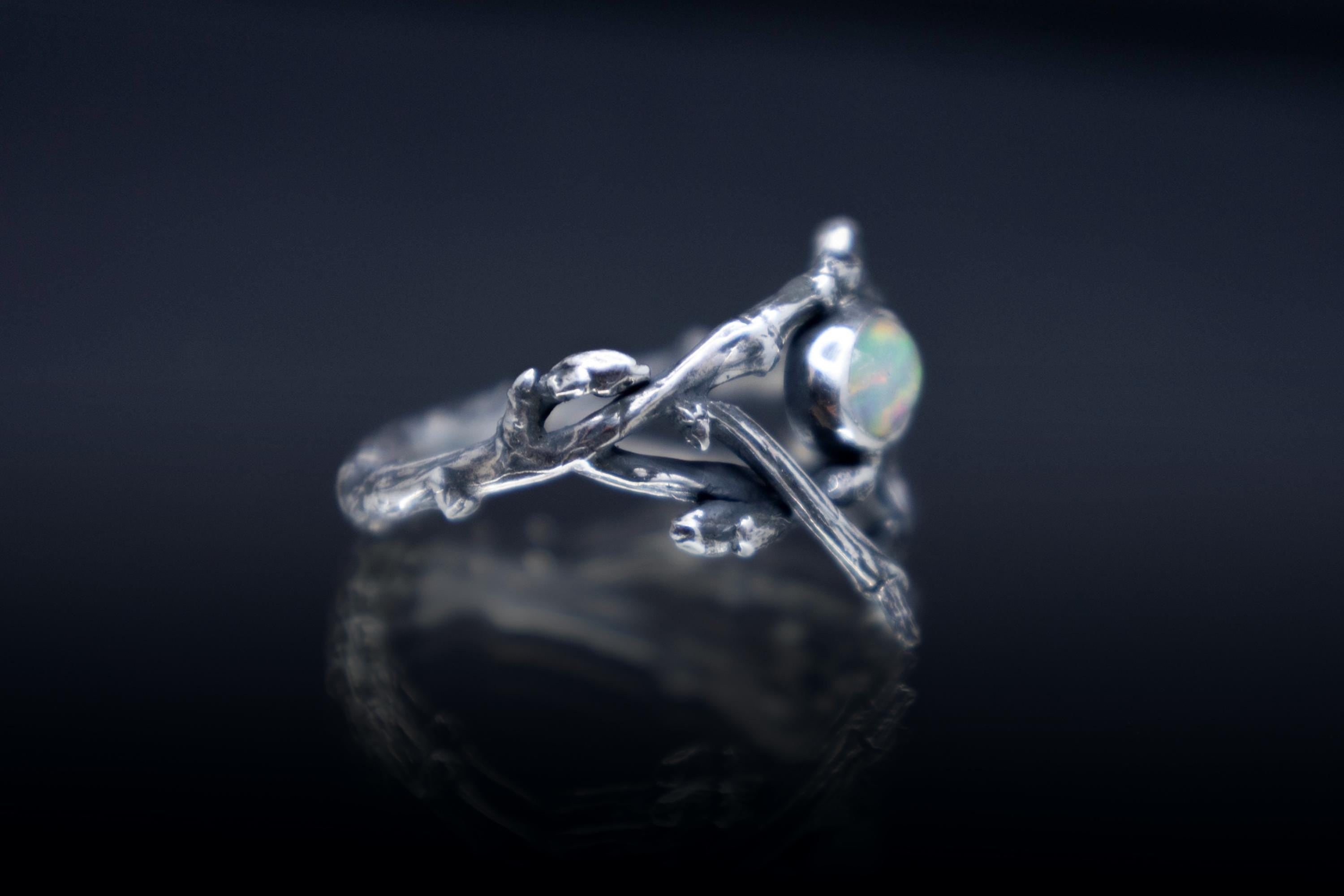 Handcrafted woodland twig ring shown from the side