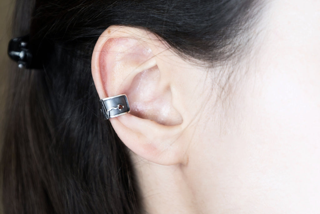 No piercing heartbeat ear cuff worn on ear