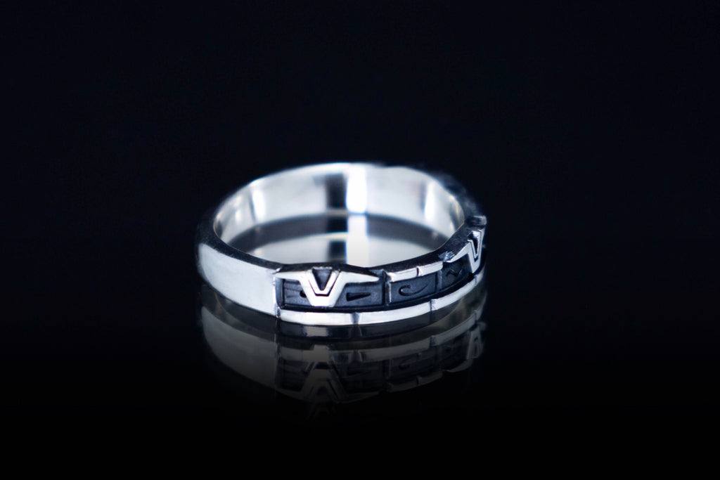 Minimalist engraved silver ring for sci-fi fans
