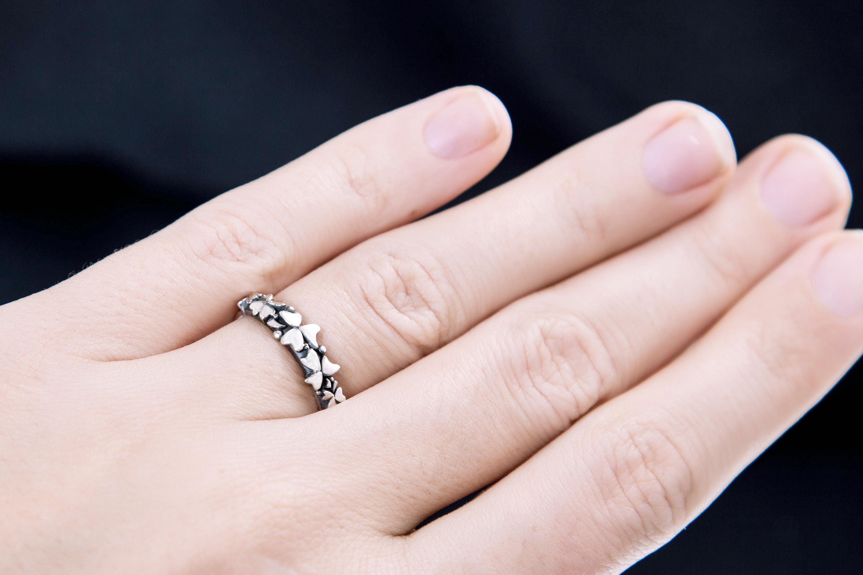 Handcrafted sterling silver botanical ring with four-leaf clover