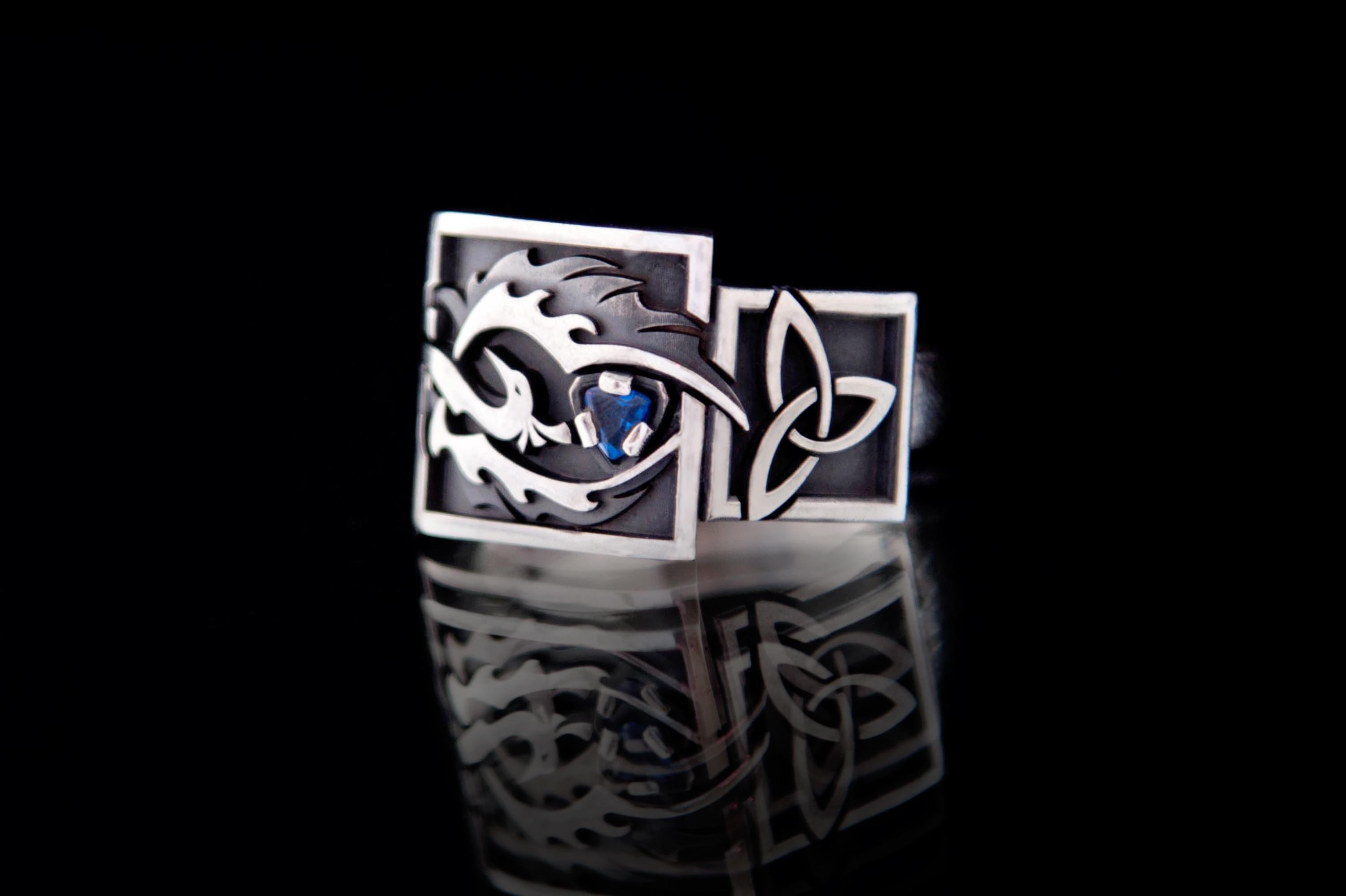 Sterling silver phoenix ring with blue cubic zirconia