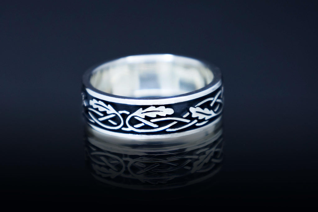 Detailed Claddagh ring with nature-inspired oak design