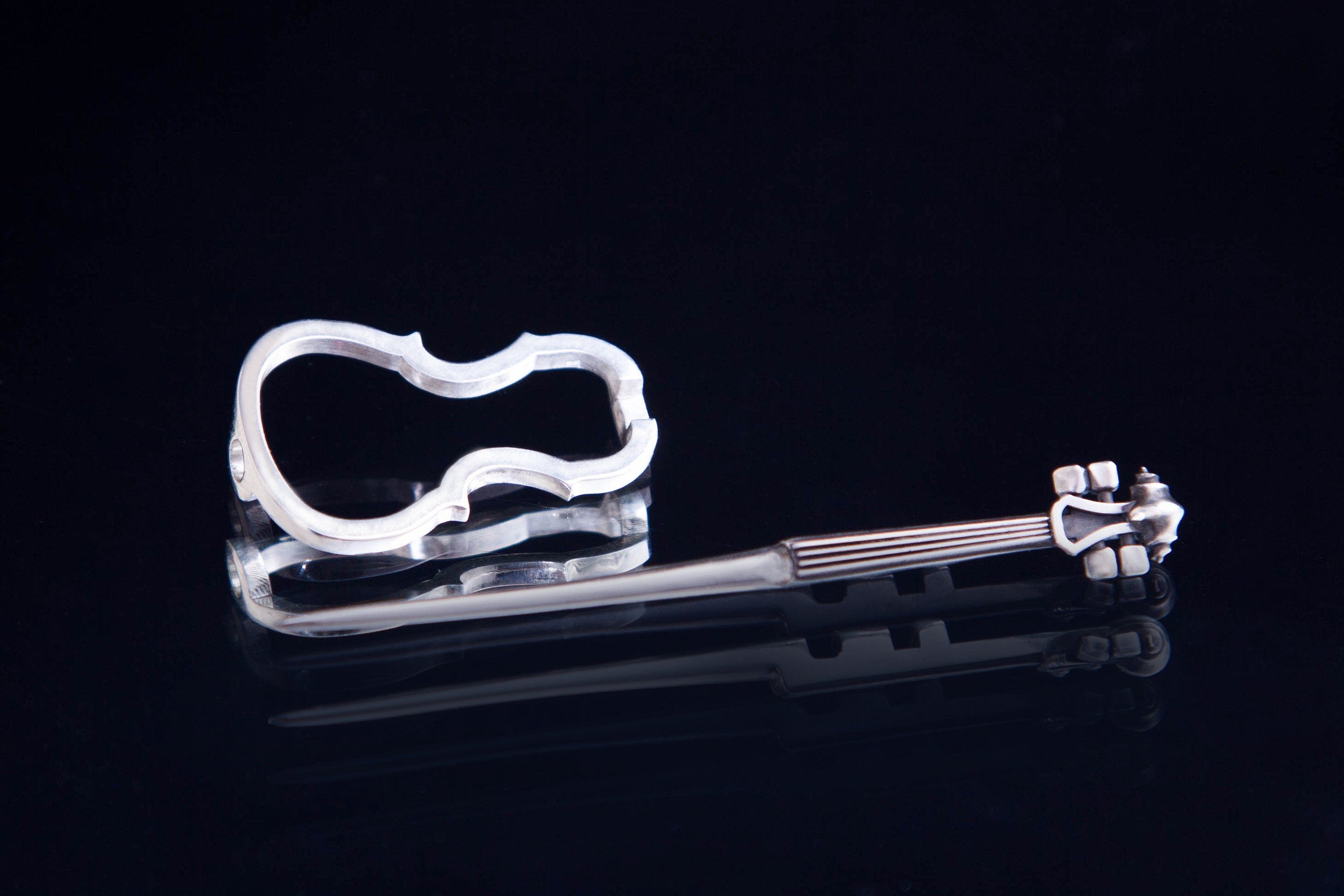 musical instrument silver pin