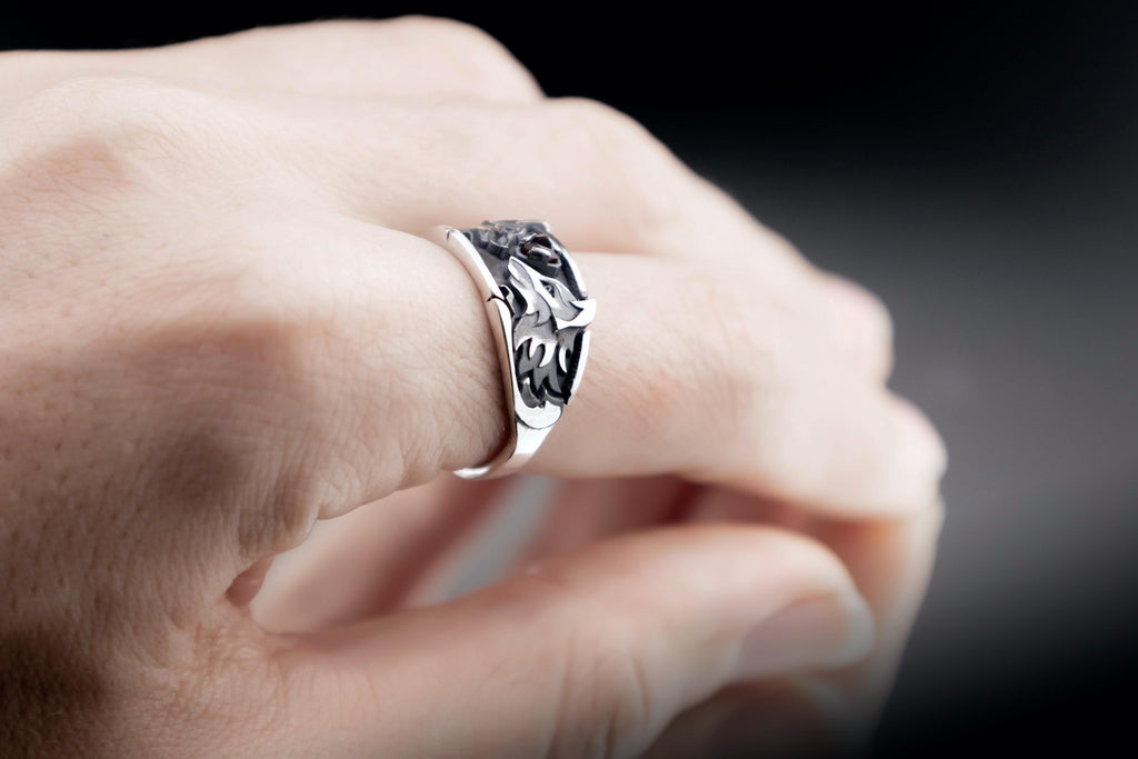 Close up of fox spirits design on silver ring