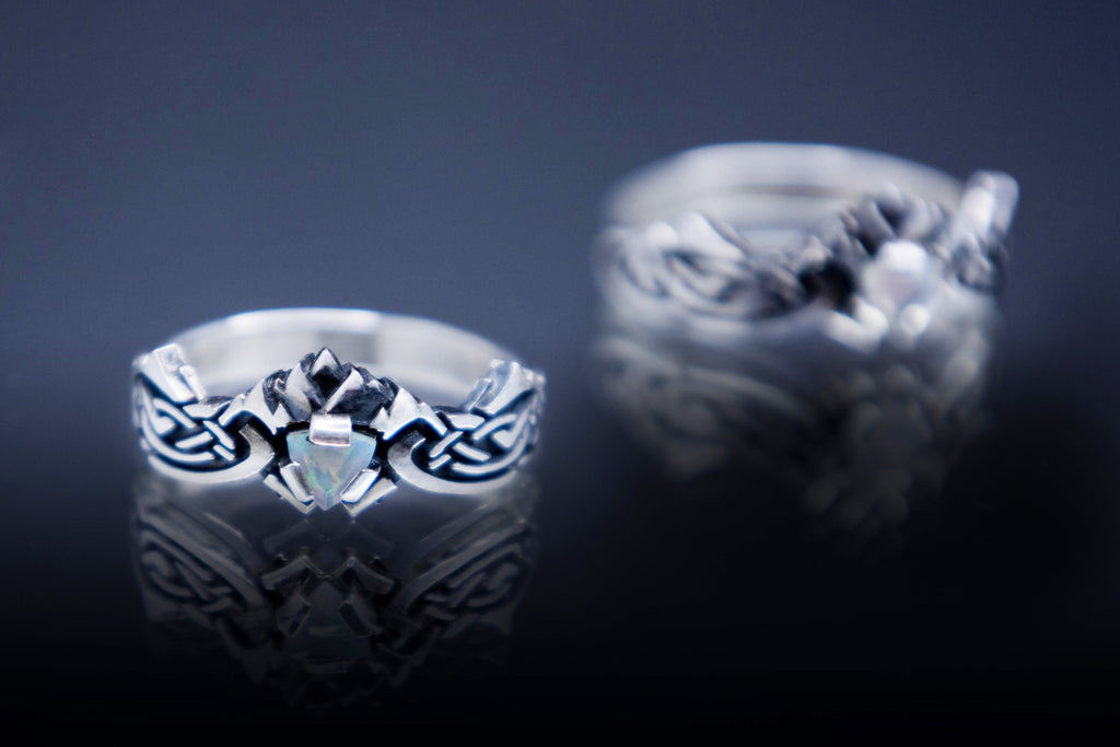 Celtic style silver ring with natural opal 