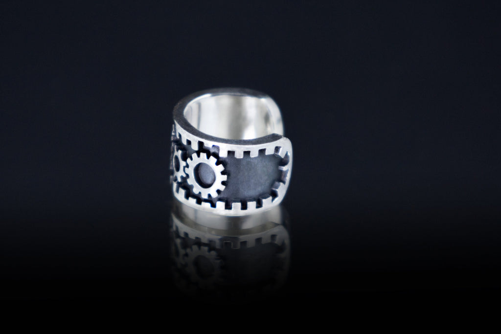 Handmade silver cog ear cuff detail