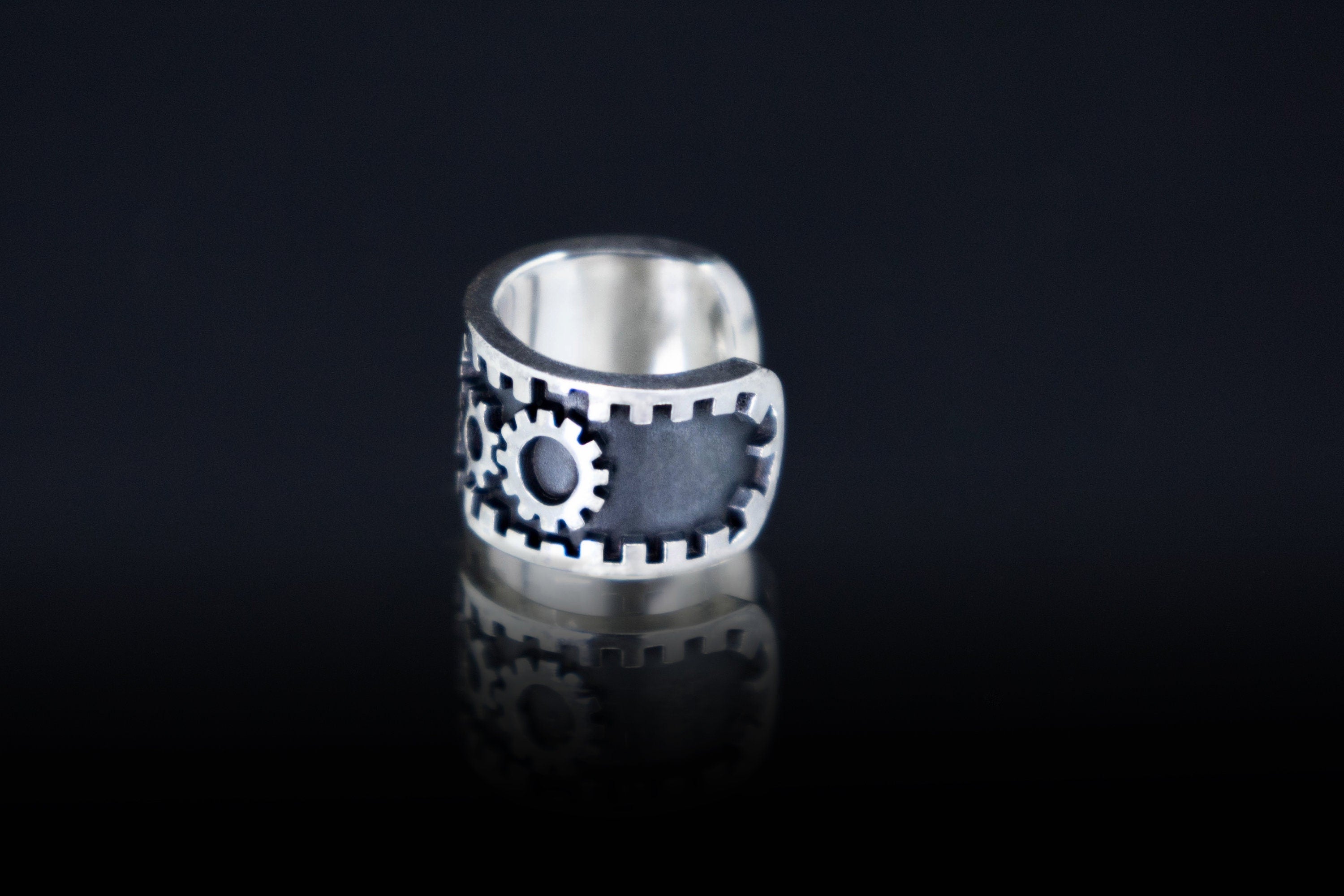 Handmade silver cog ear cuff detail