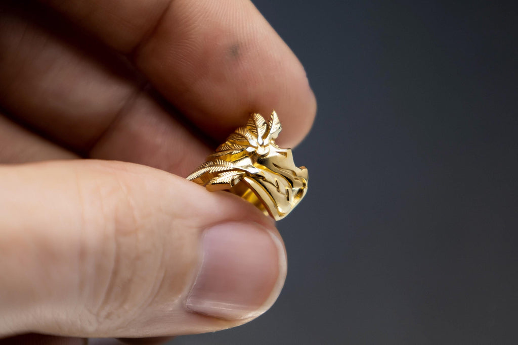 Feathered serpent ear cuff inspired by Aztec mythology