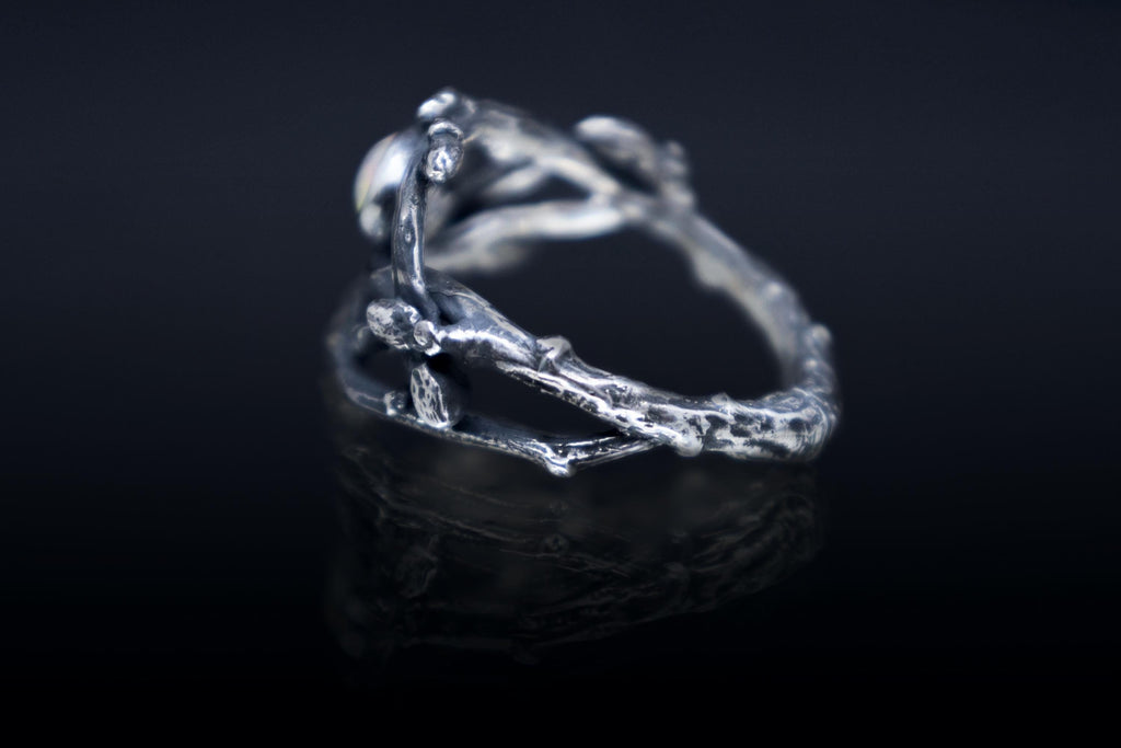 Silver ring made from real cast twigs with opal