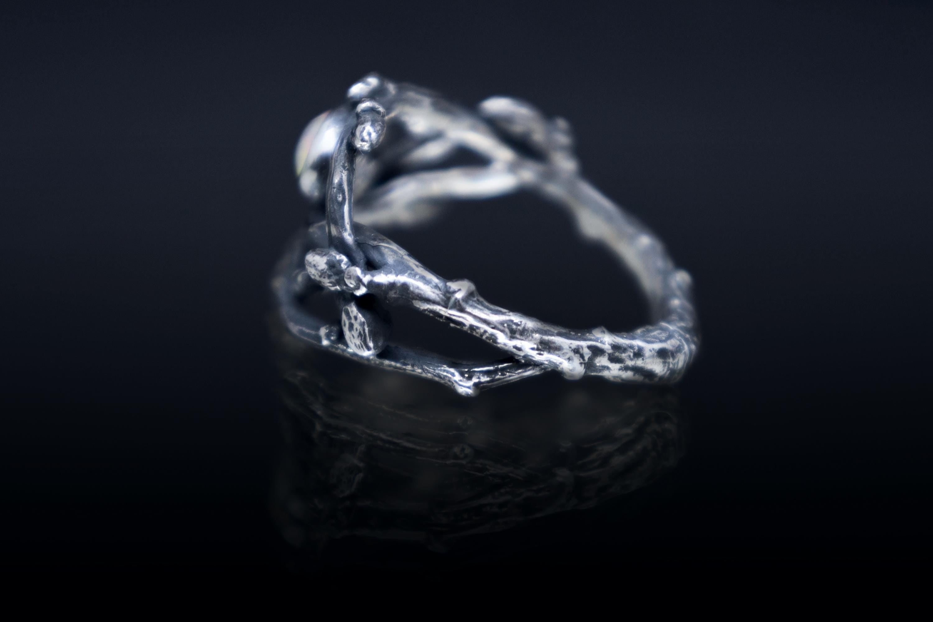 Silver ring made from real cast twigs with opal