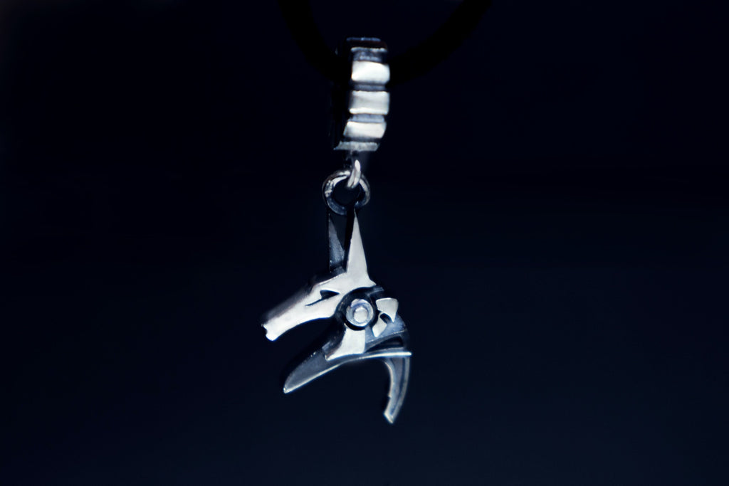 Small silver Anubis charm on chain, mythological jewelry