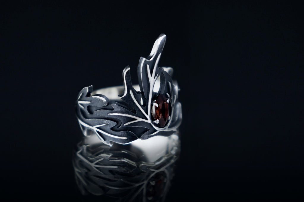 Sterling silver wormwood leaf ring with garnet, magic statement band