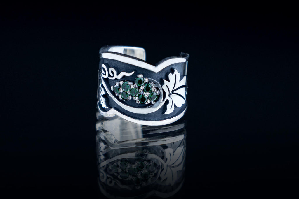 Green stone detail on grapevine ear cuff