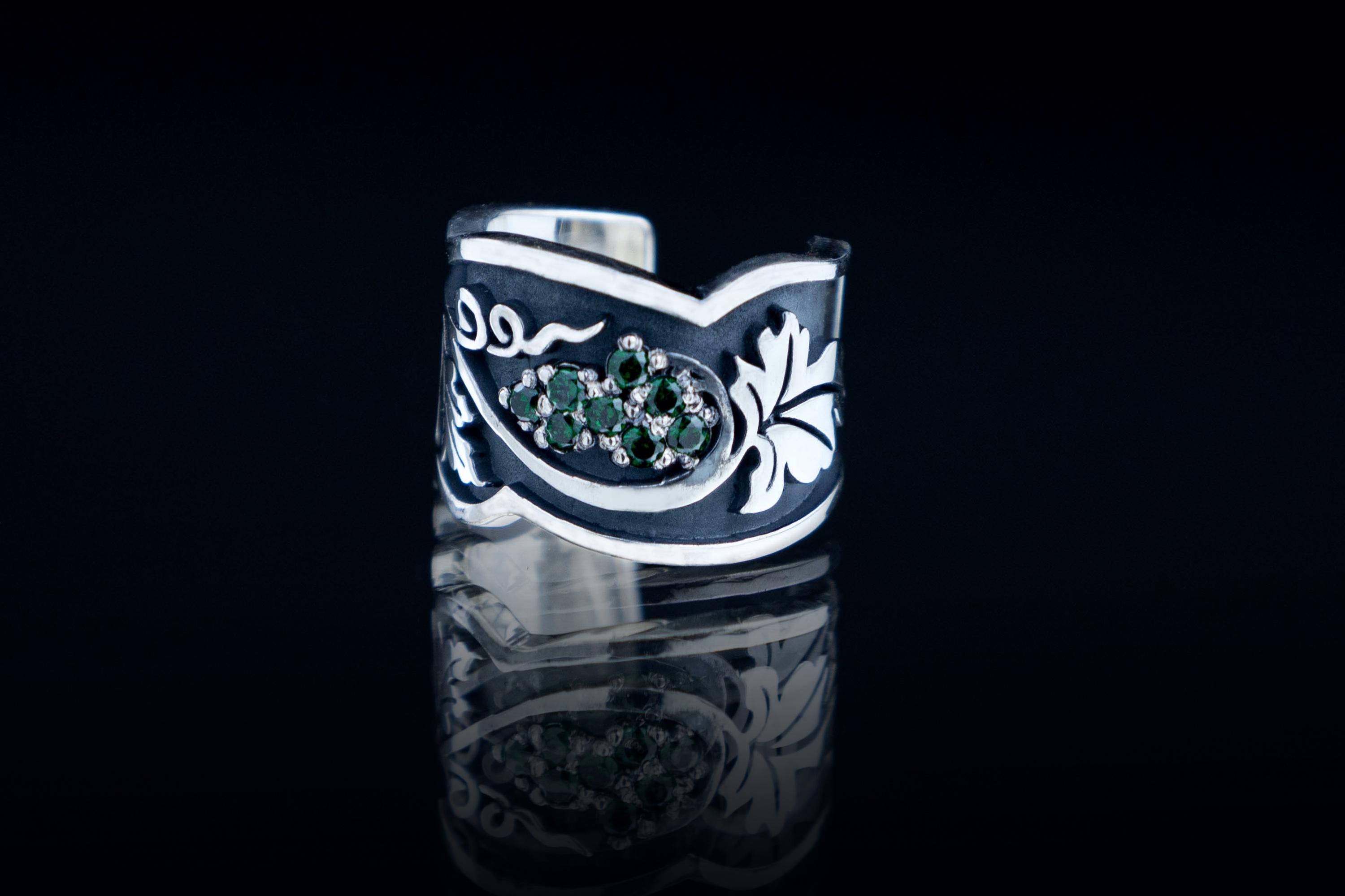 Green stone detail on grapevine ear cuff