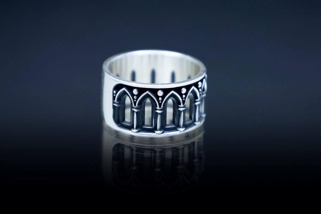 Oxidized architectural silver band with medieval arches