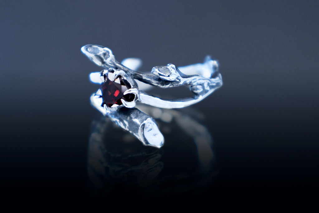 Handmade sterling silver branch band with trillion garnet