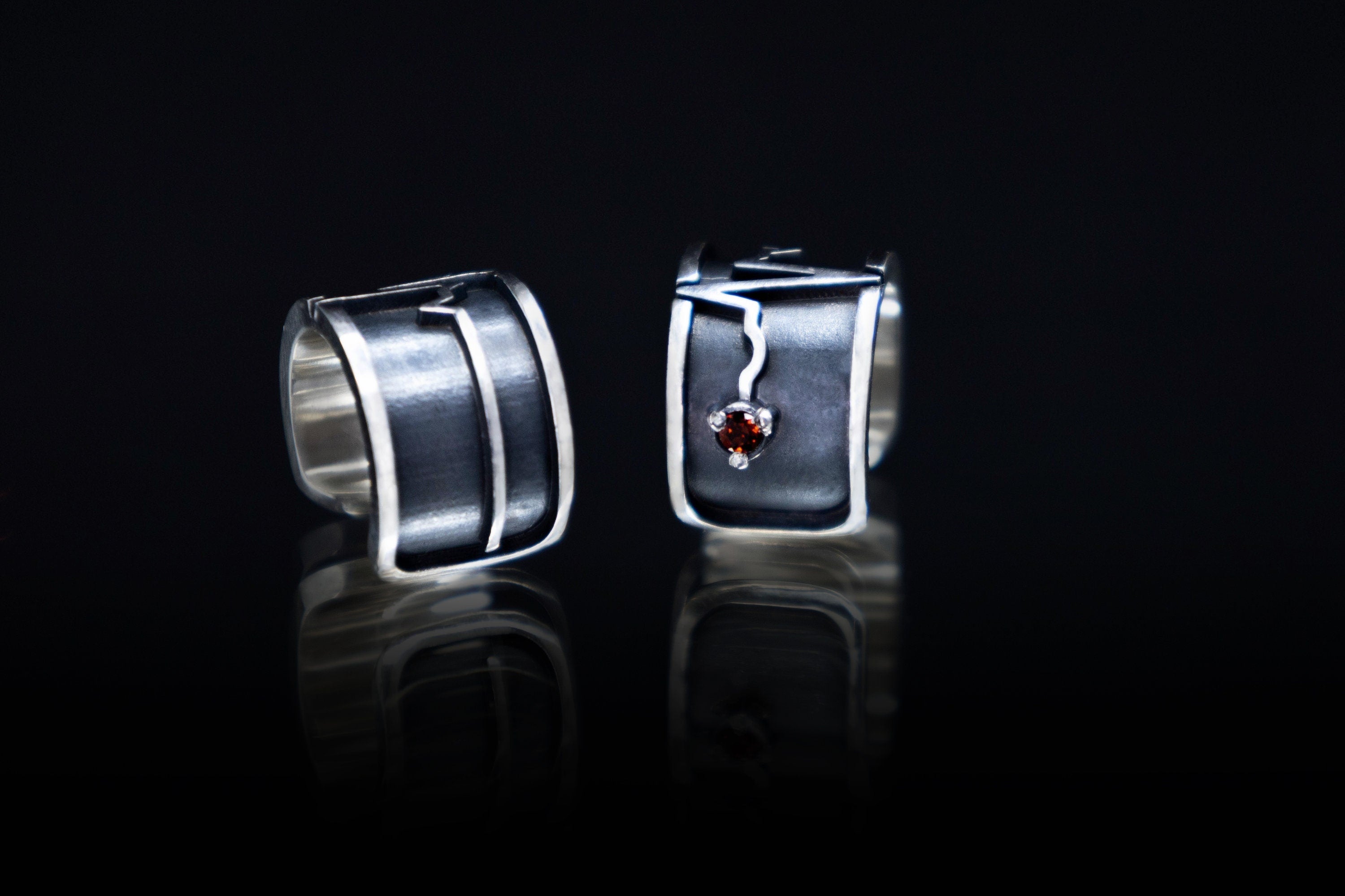 Minimalist silver ear cuff with red garnet accent