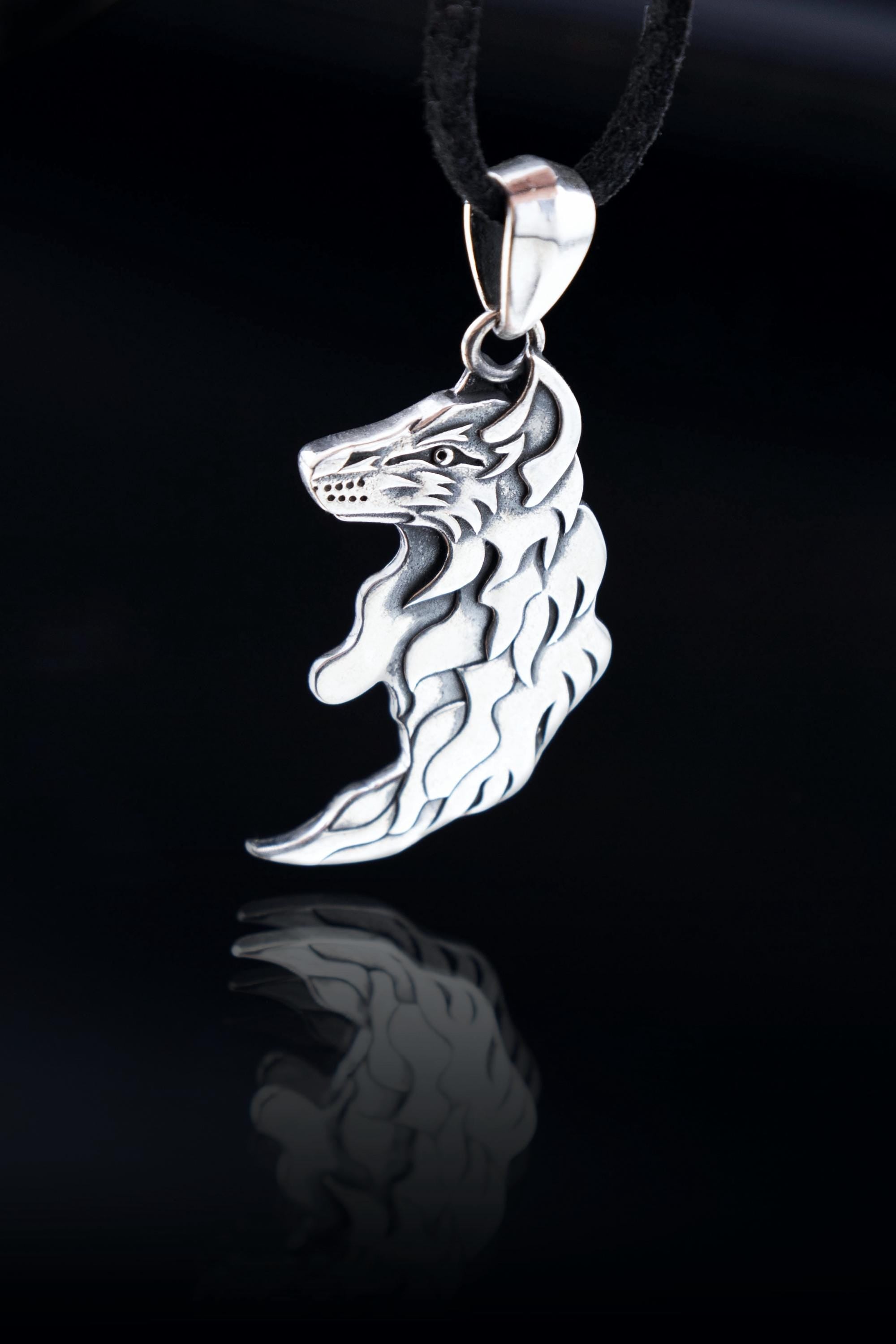 sterling silver wolf pendant one of matching pair