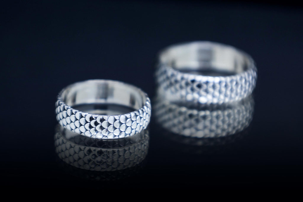 Dragon inspired silver ring with detailed scale texture