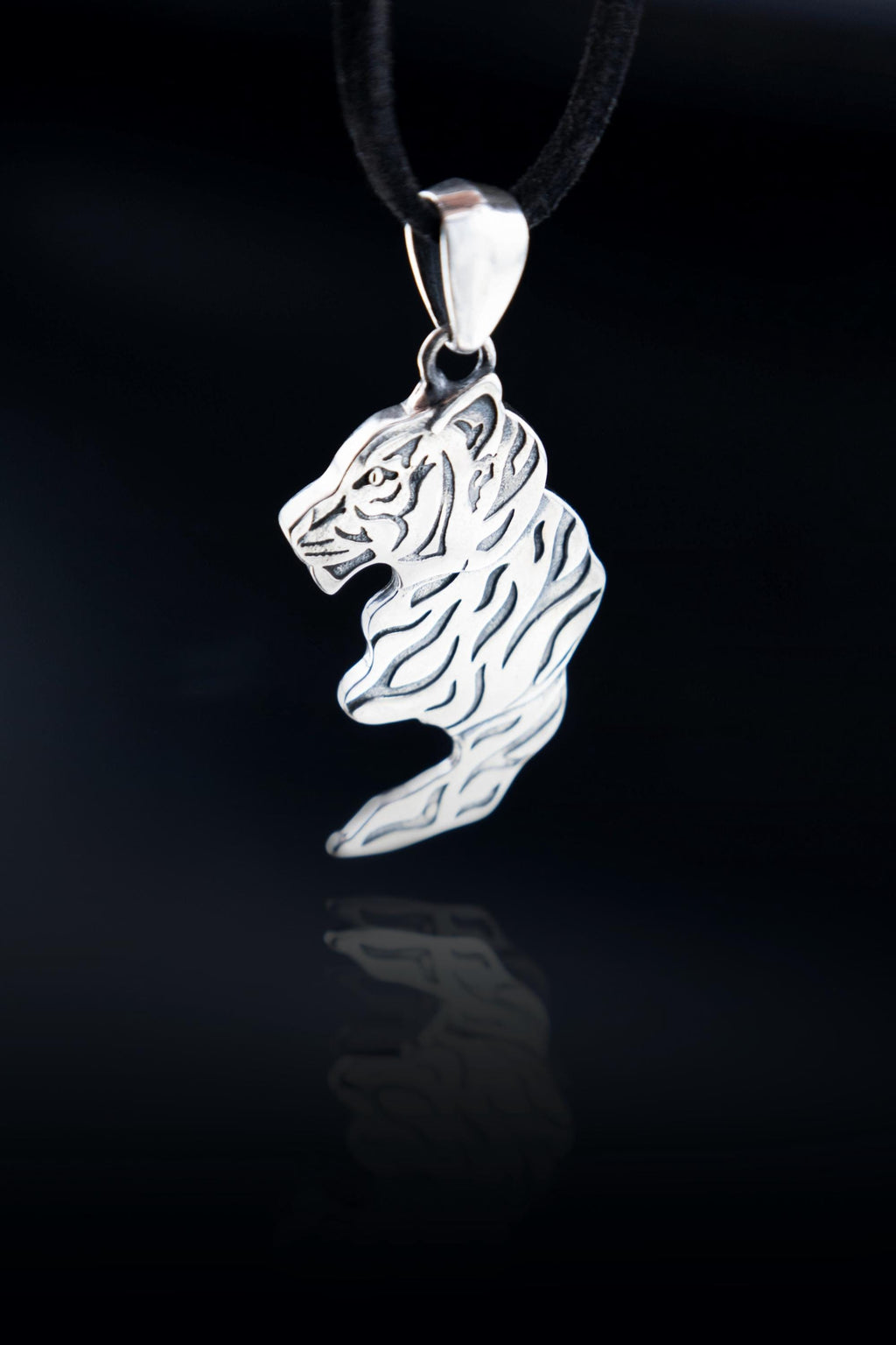 sterling silver tiger pendant one of matching pair