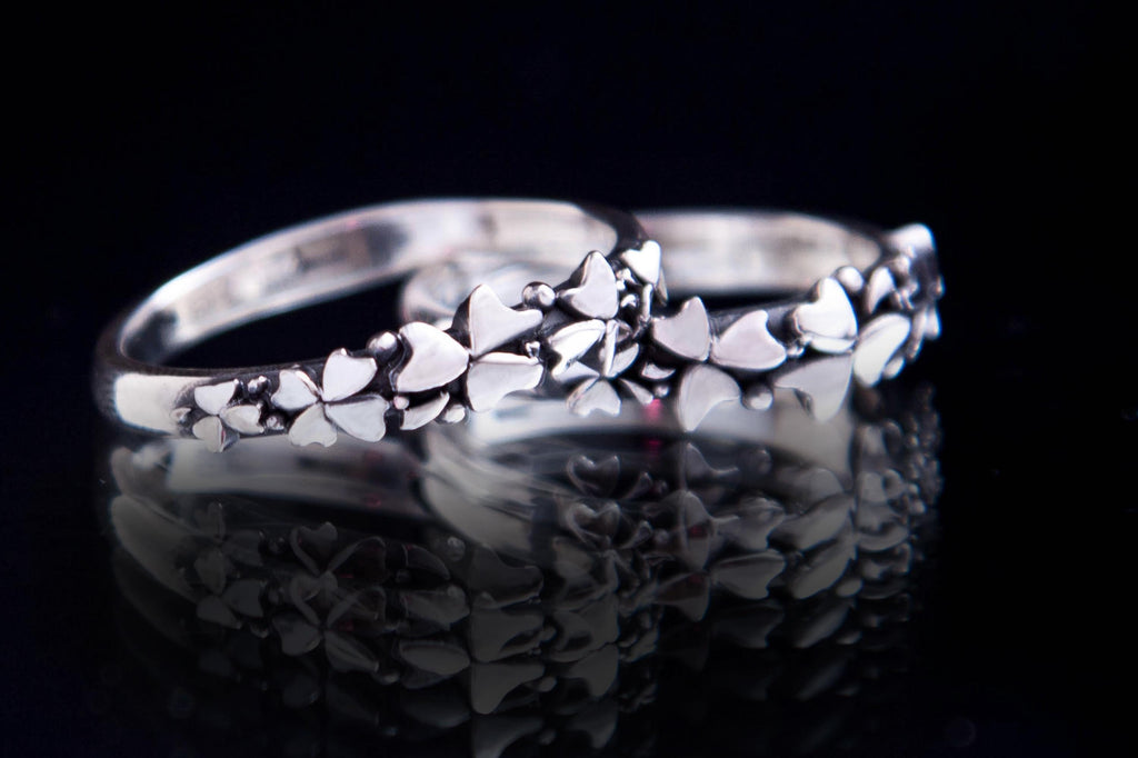 Sterling silver clover ring with four-leaf design,  handmade botanical jewelry by DreamTower