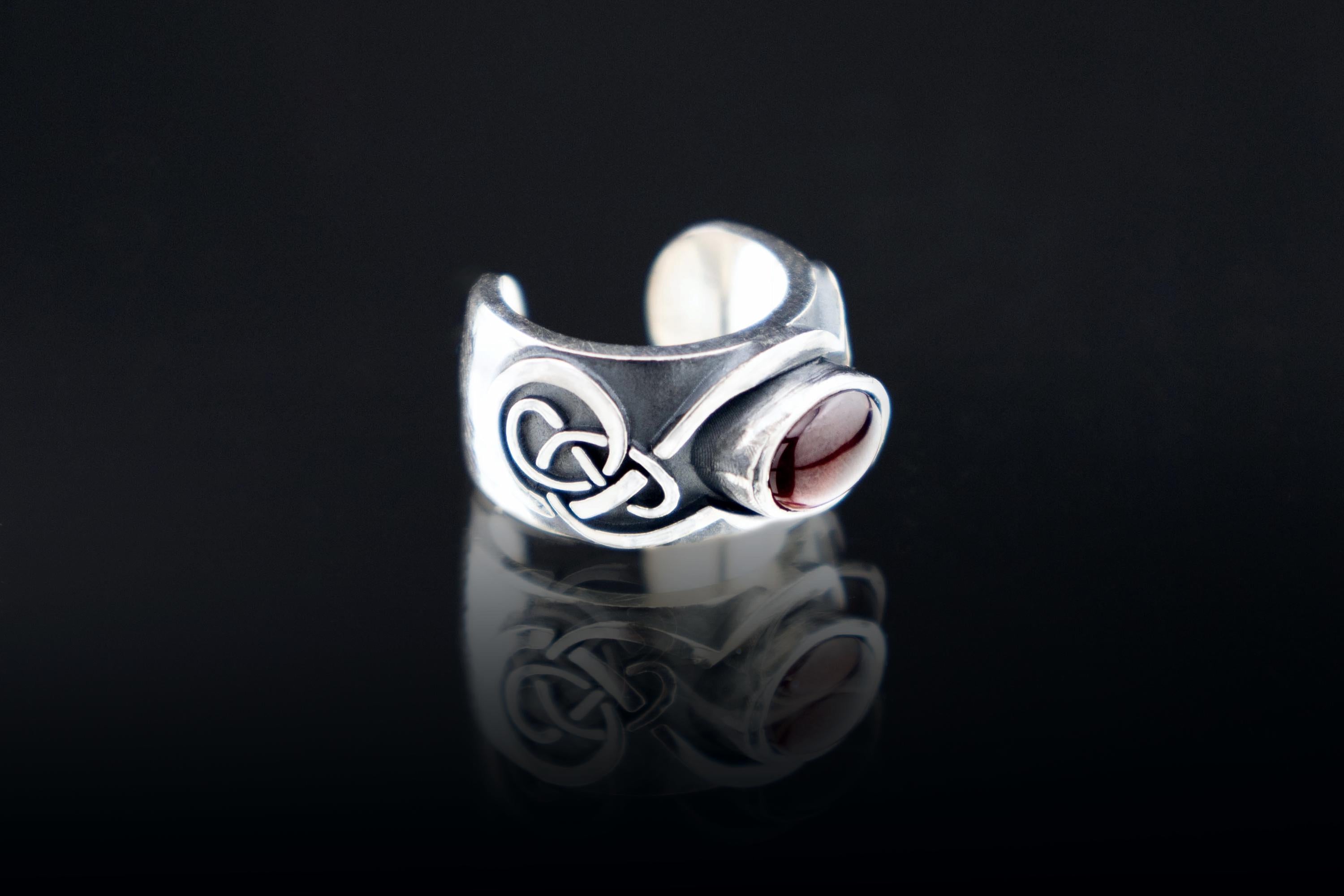 Silver Celtic ear cuff with garnet