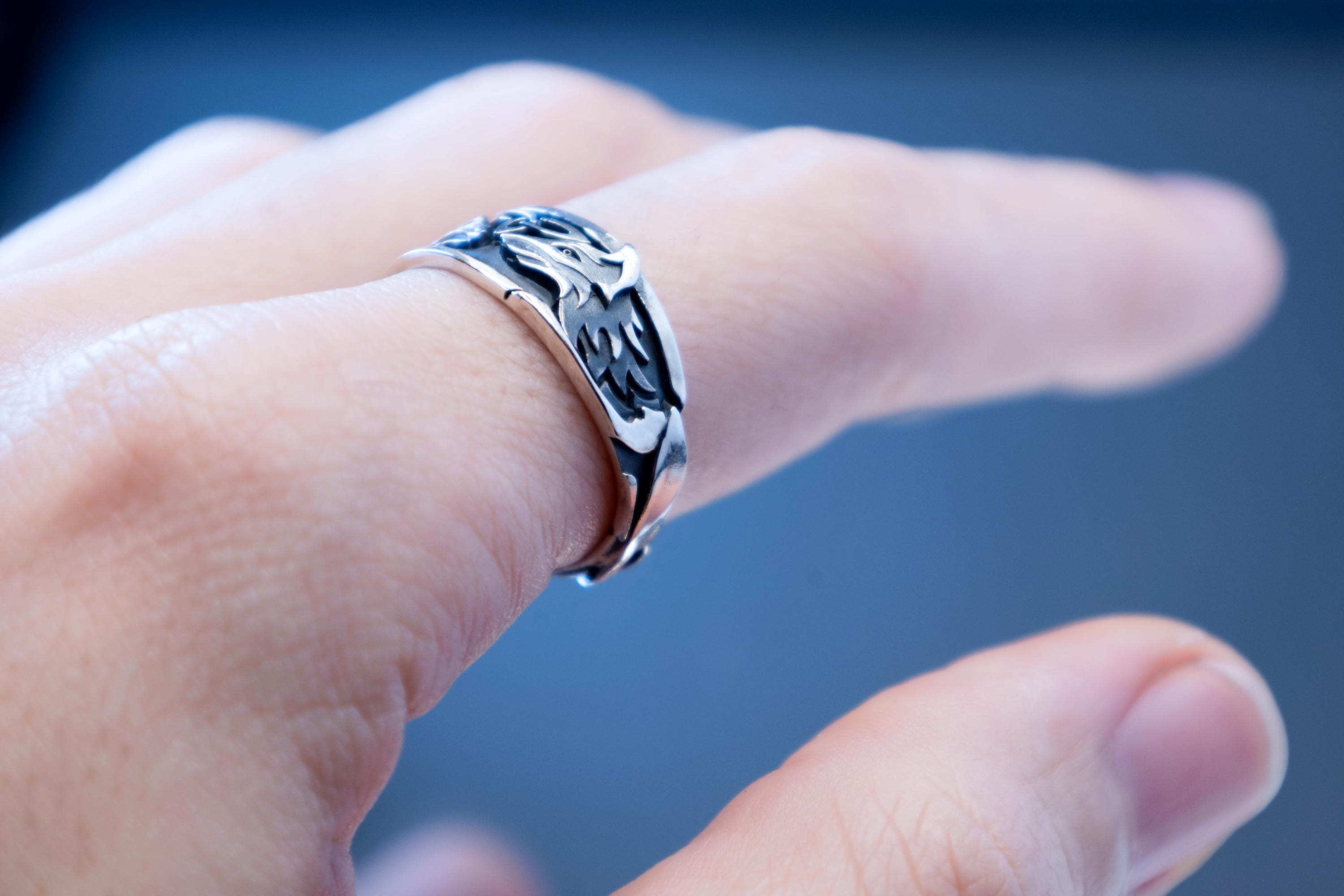 Dragon and fox silver ring worn on hand