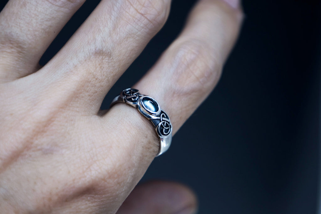Silver labradorite Celtic ring worn on hand