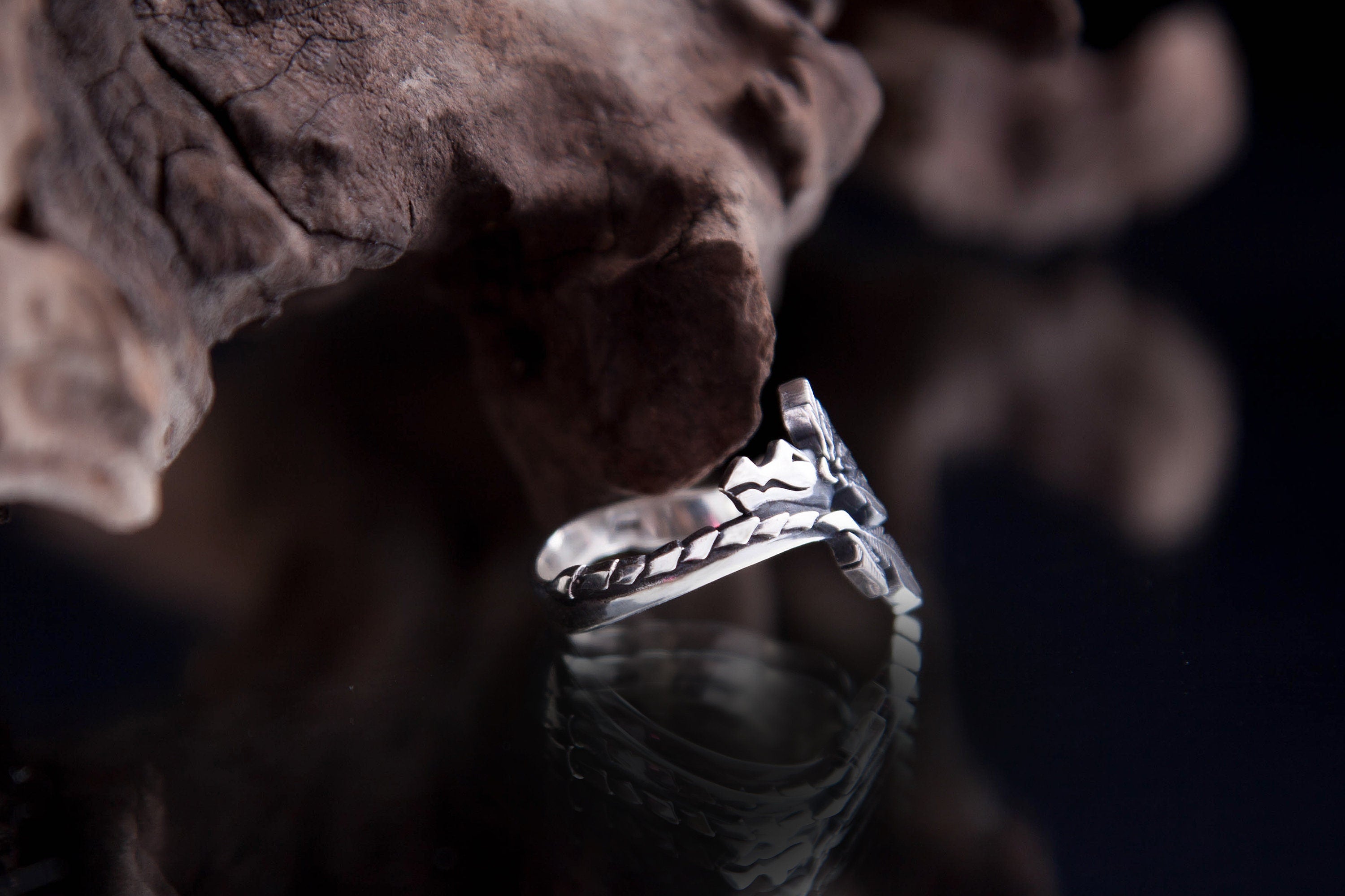 Aztec dragon themed silver ring with sculpted scales