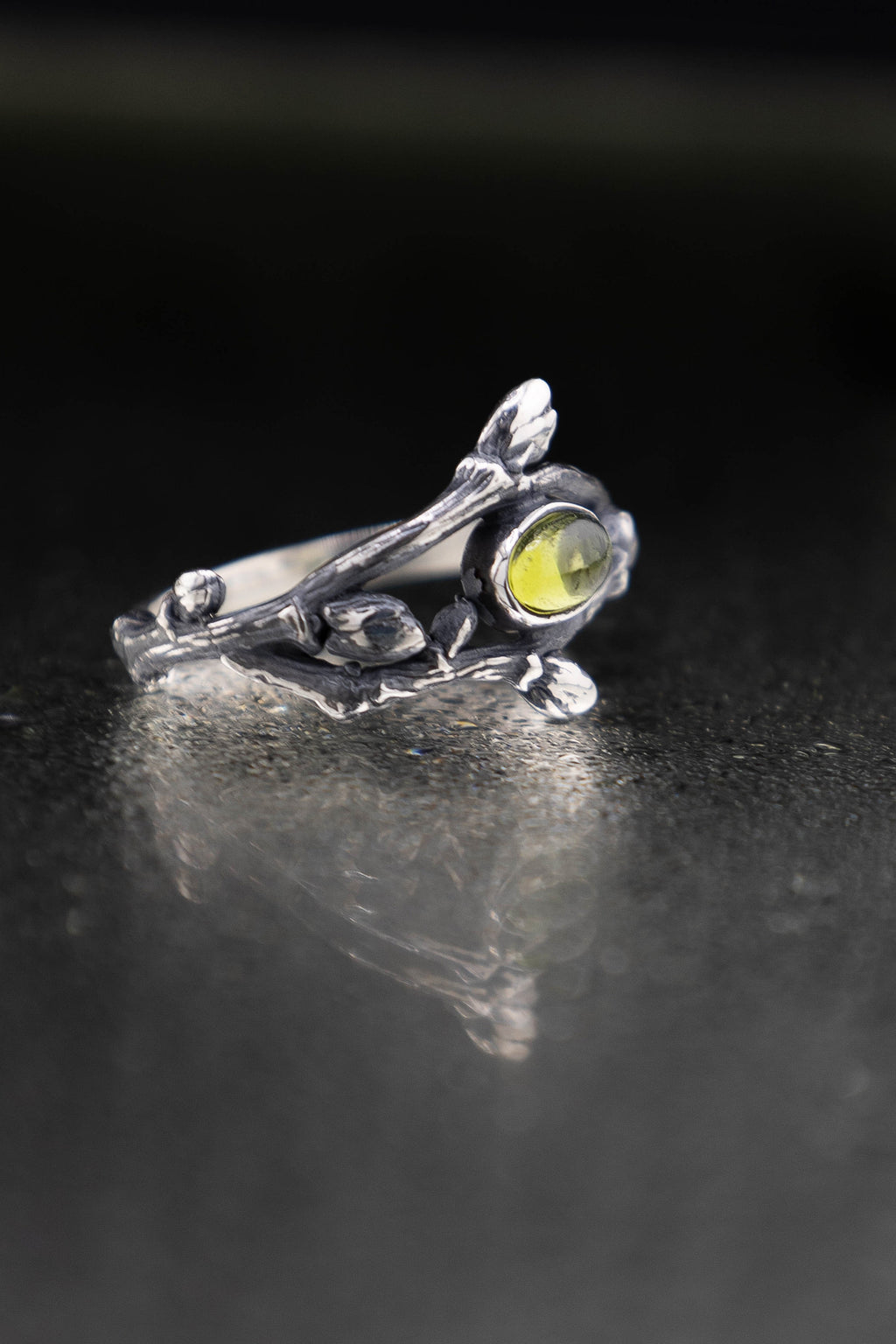 Nature inspired branch ring with peridot gemstone