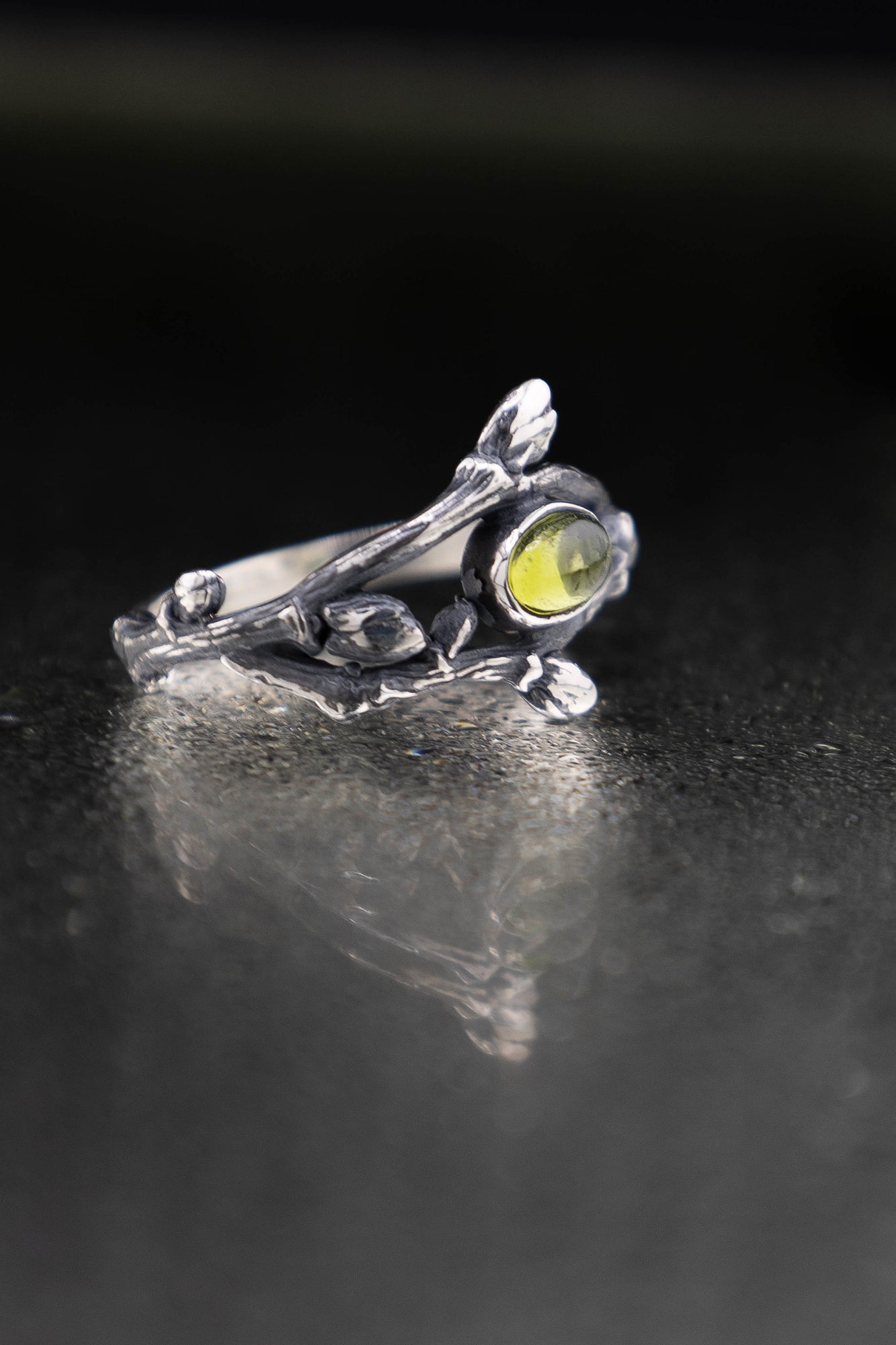 Nature inspired branch ring with peridot gemstone