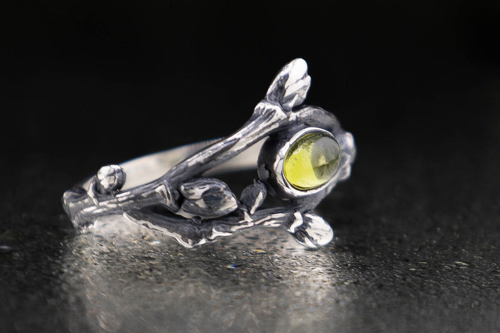 Sterling silver twig ring with green peridot