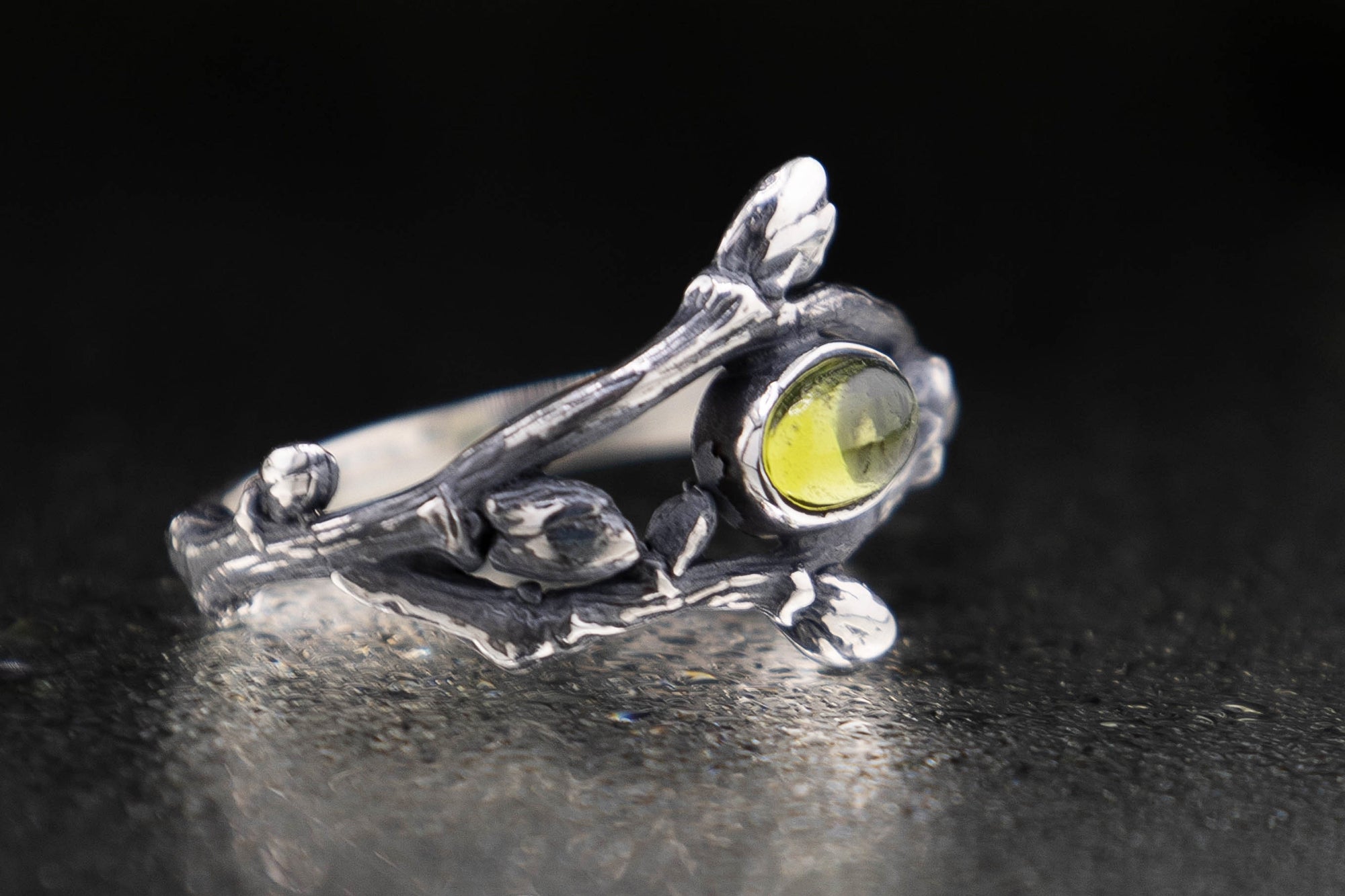Sterling silver twig ring with green peridot