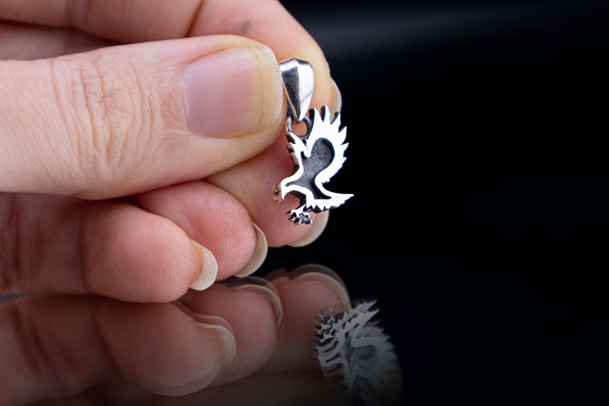 detailed raven jewelry close up - back view 